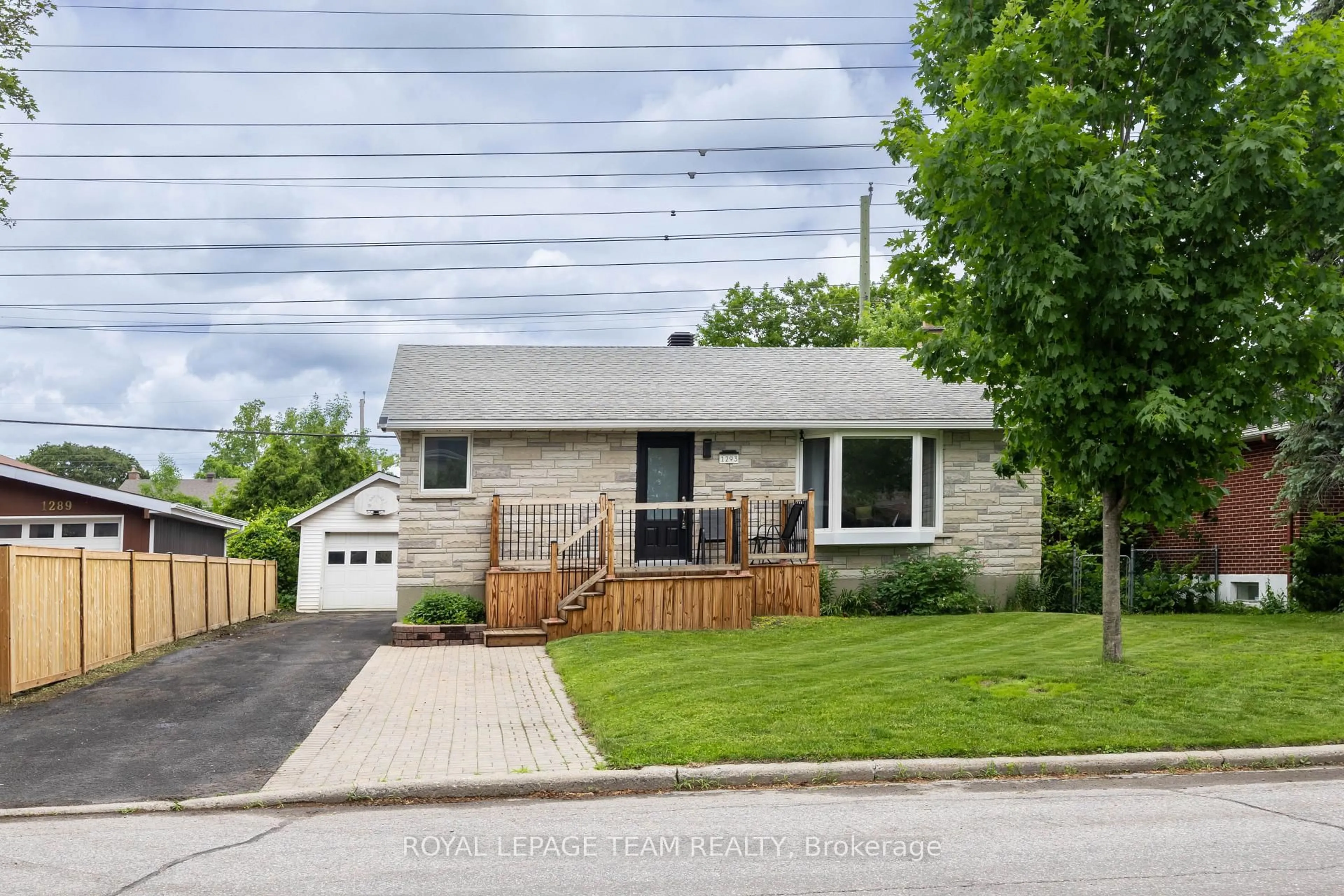 Home with brick exterior material, street for 1293 Woodside Dr, Ottawa Ontario K2C 2H1