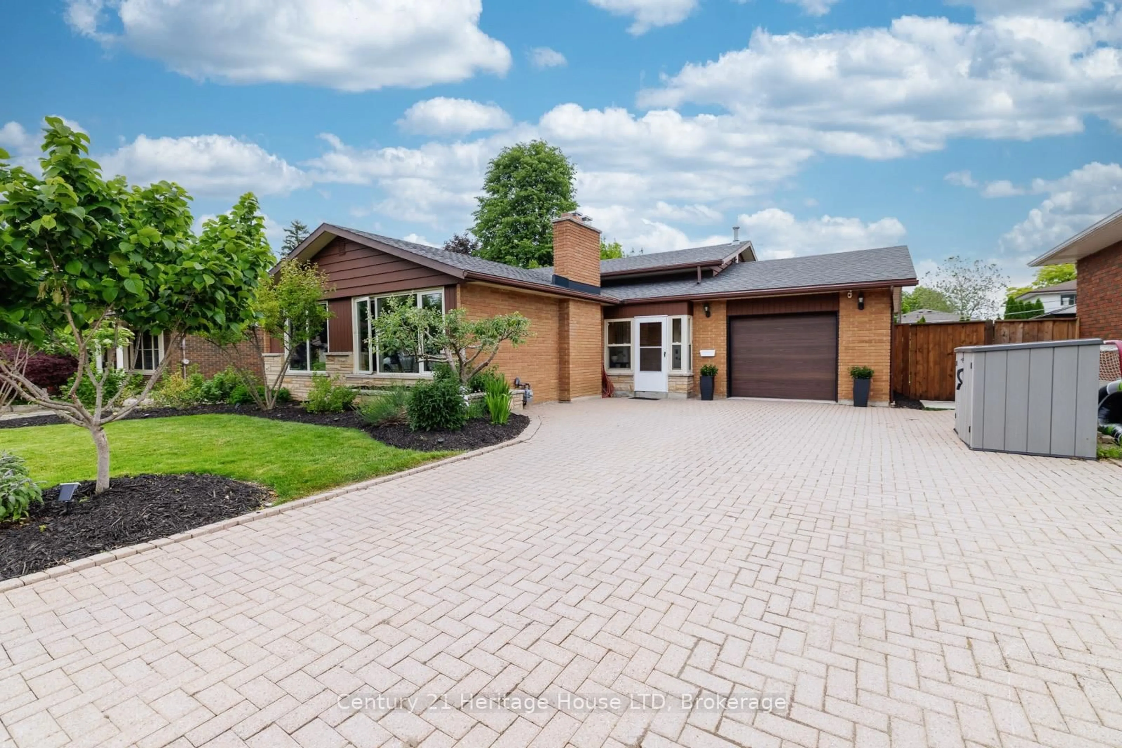 Home with brick exterior material, street for 14 Stanley St, St. Catharines Ontario L2M 1S6