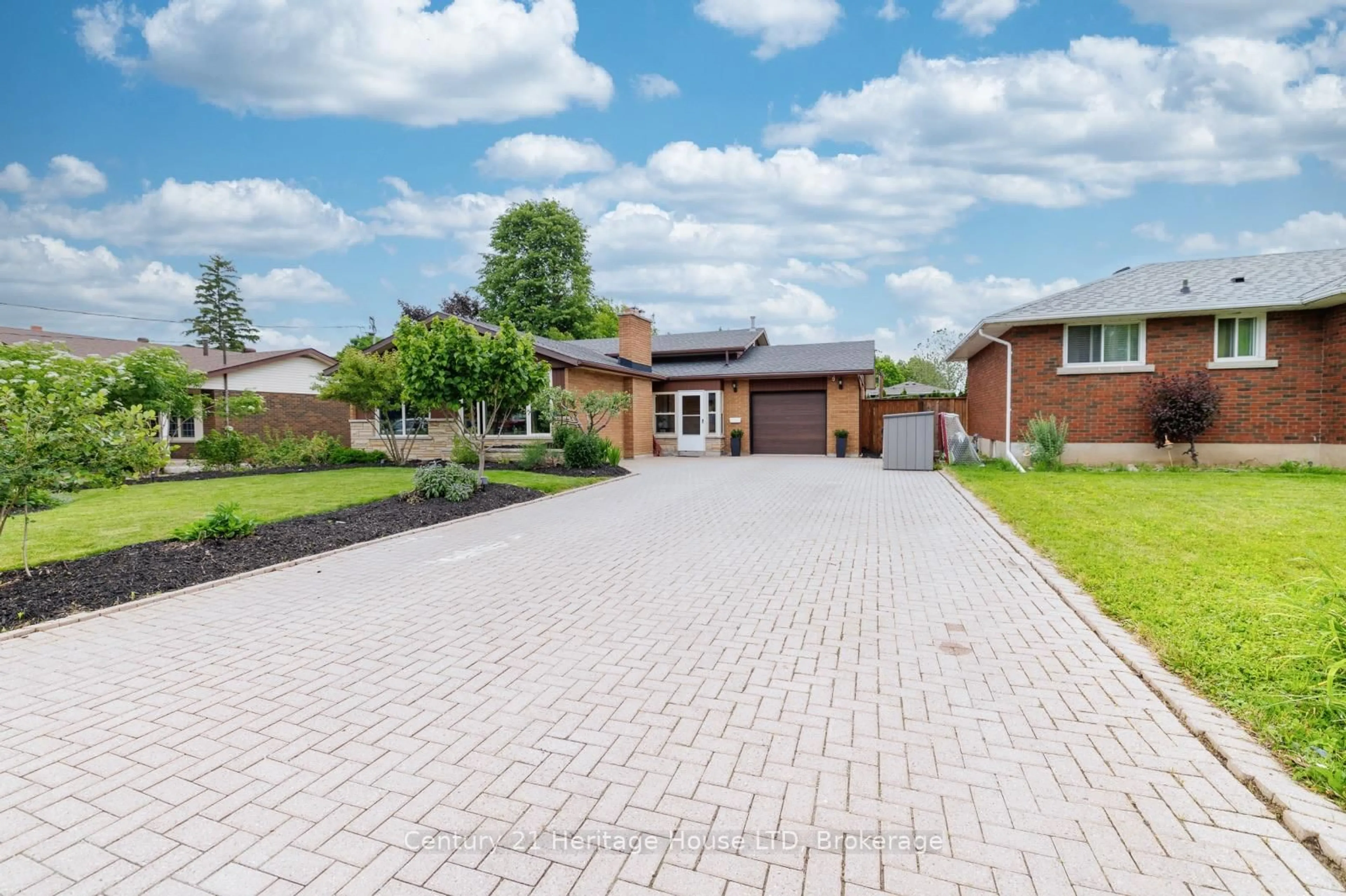 Home with brick exterior material, street for 14 Stanley St, St. Catharines Ontario L2M 1S6