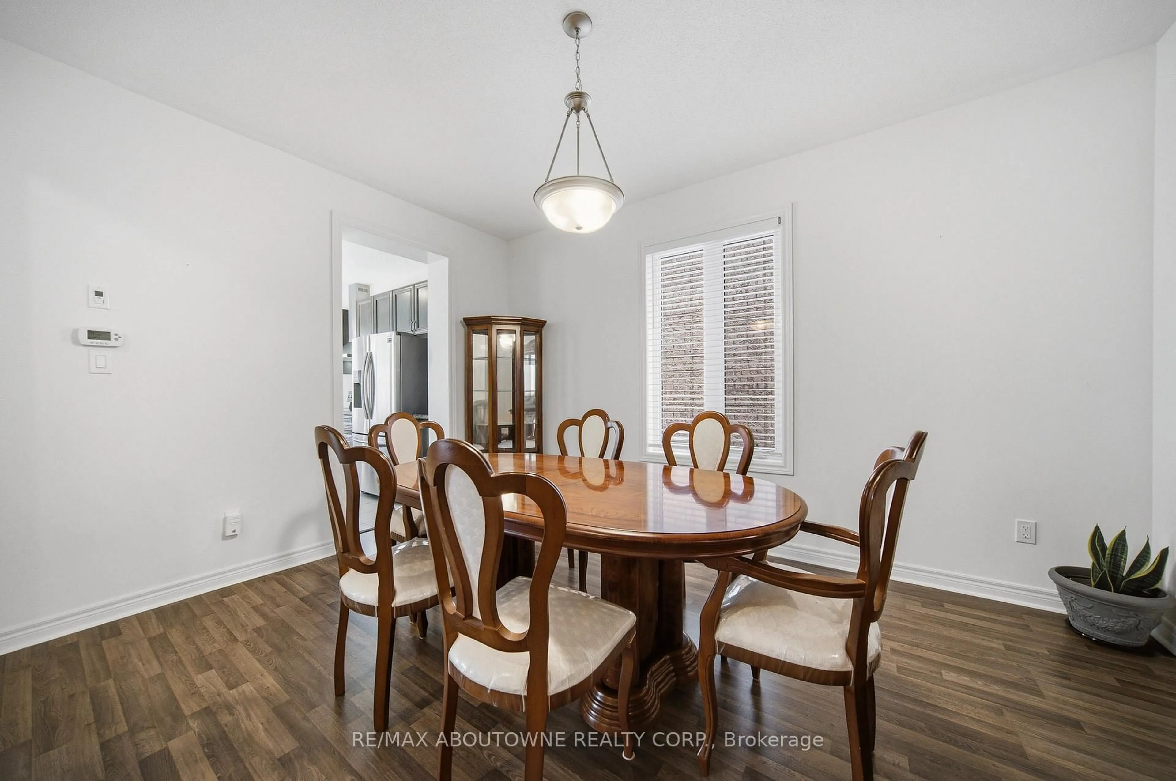 Dining room, wood/laminate floor for 12 Oldham Ave, Brant Ontario N3L 0G7