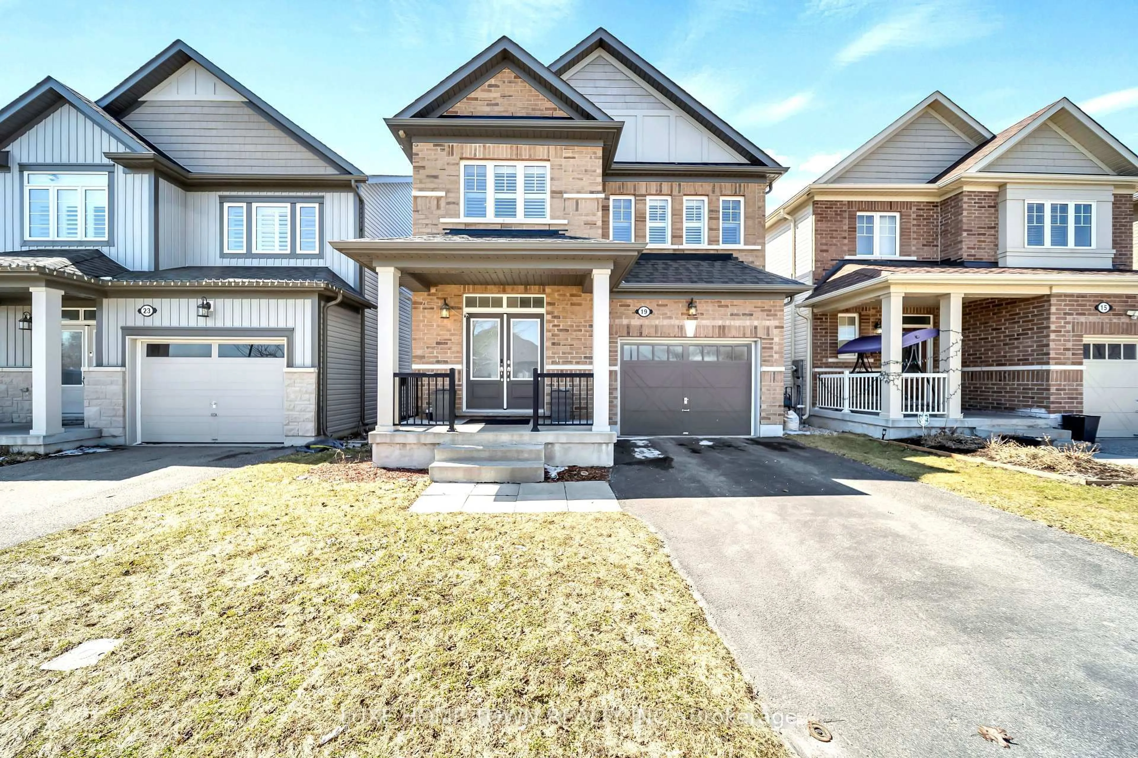 Home with brick exterior material, street for 19 Findlay Way, Centre Wellington Ontario N1M 0A4