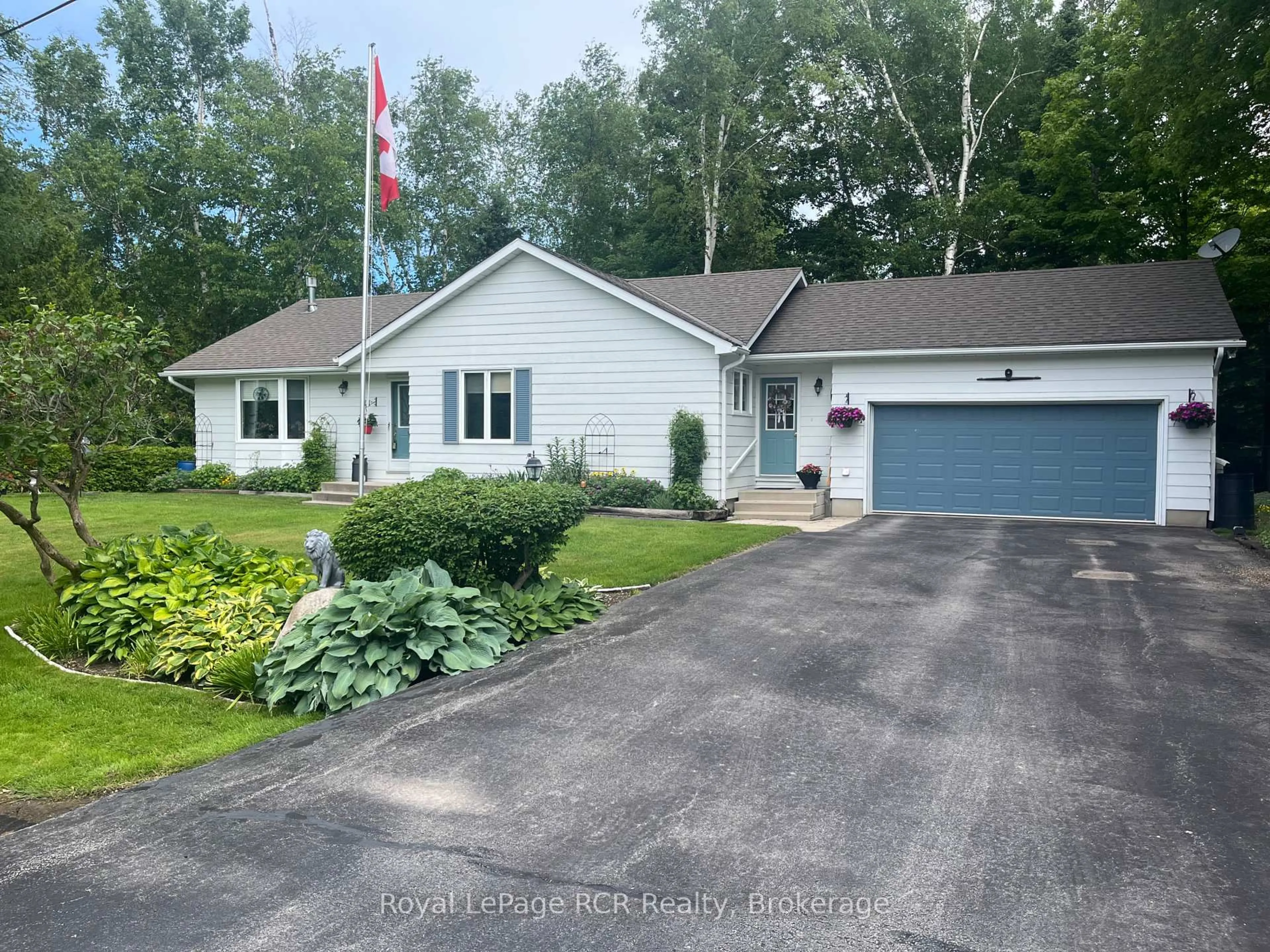 A pic from outside/outdoor area/front of a property/back of a property/a pic from drone, street for 11 Graham Cres, South Bruce Peninsula Ontario N0H 2G0