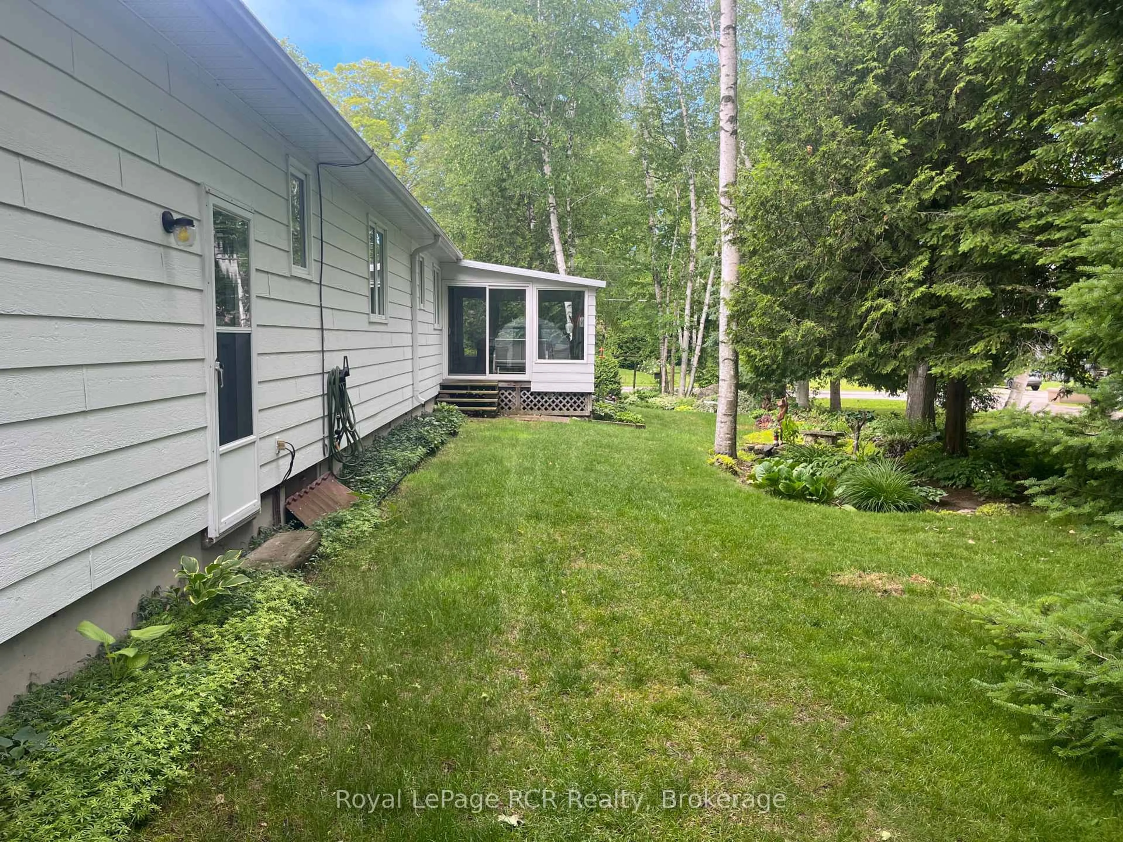 A pic from outside/outdoor area/front of a property/back of a property/a pic from drone, forest/trees view for 11 Graham Cres, South Bruce Peninsula Ontario N0H 2G0