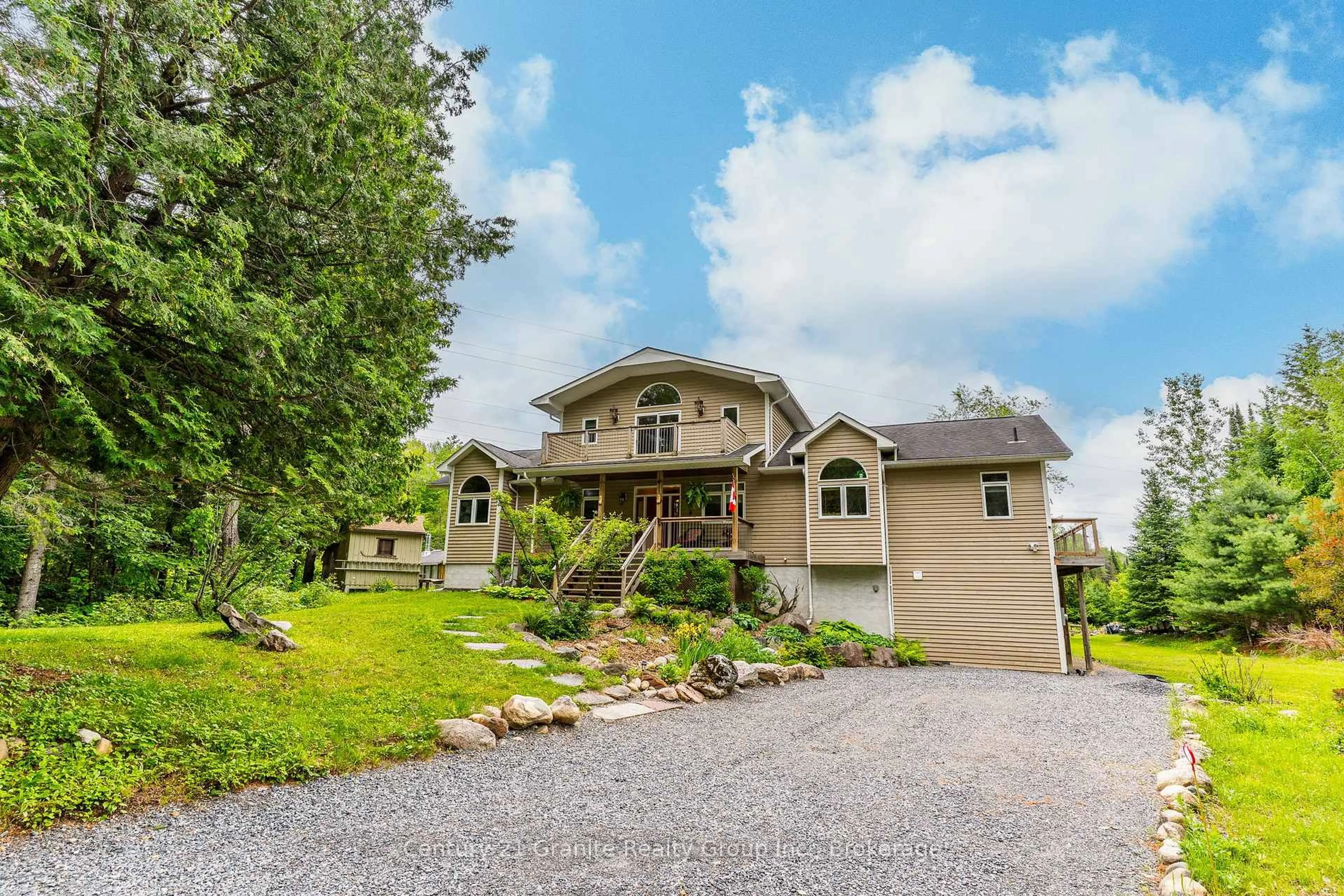 A pic from outside/outdoor area/front of a property/back of a property/a pic from drone, mountain view for 1003 Pontiac Dr, Minden Hills Ontario K0M 2K0