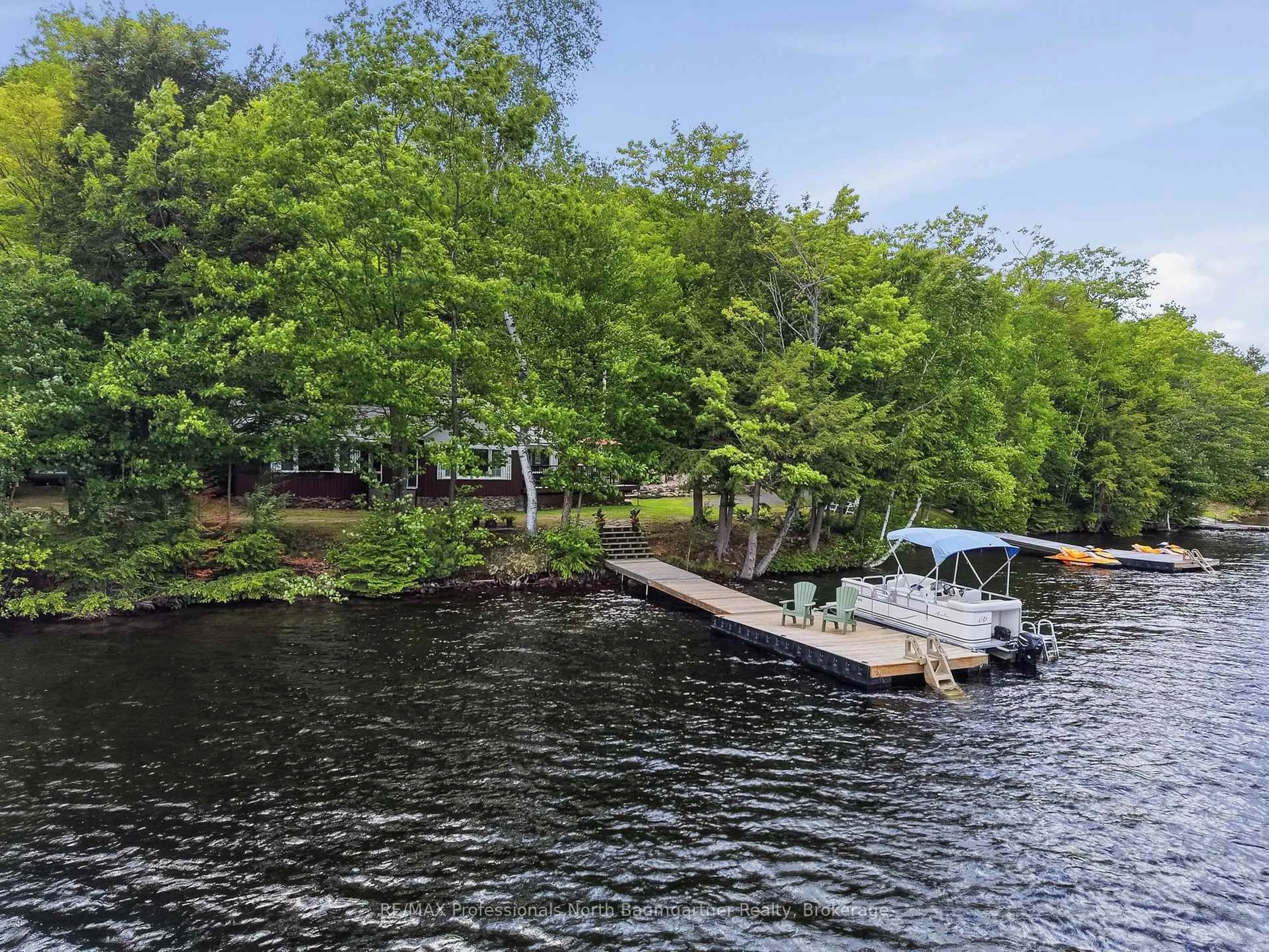 A pic from outside/outdoor area/front of a property/back of a property/a pic from drone, water/lake/river/ocean view for 3494 Kushog Lake Rd, Algonquin Highlands Ontario K0M 1S0