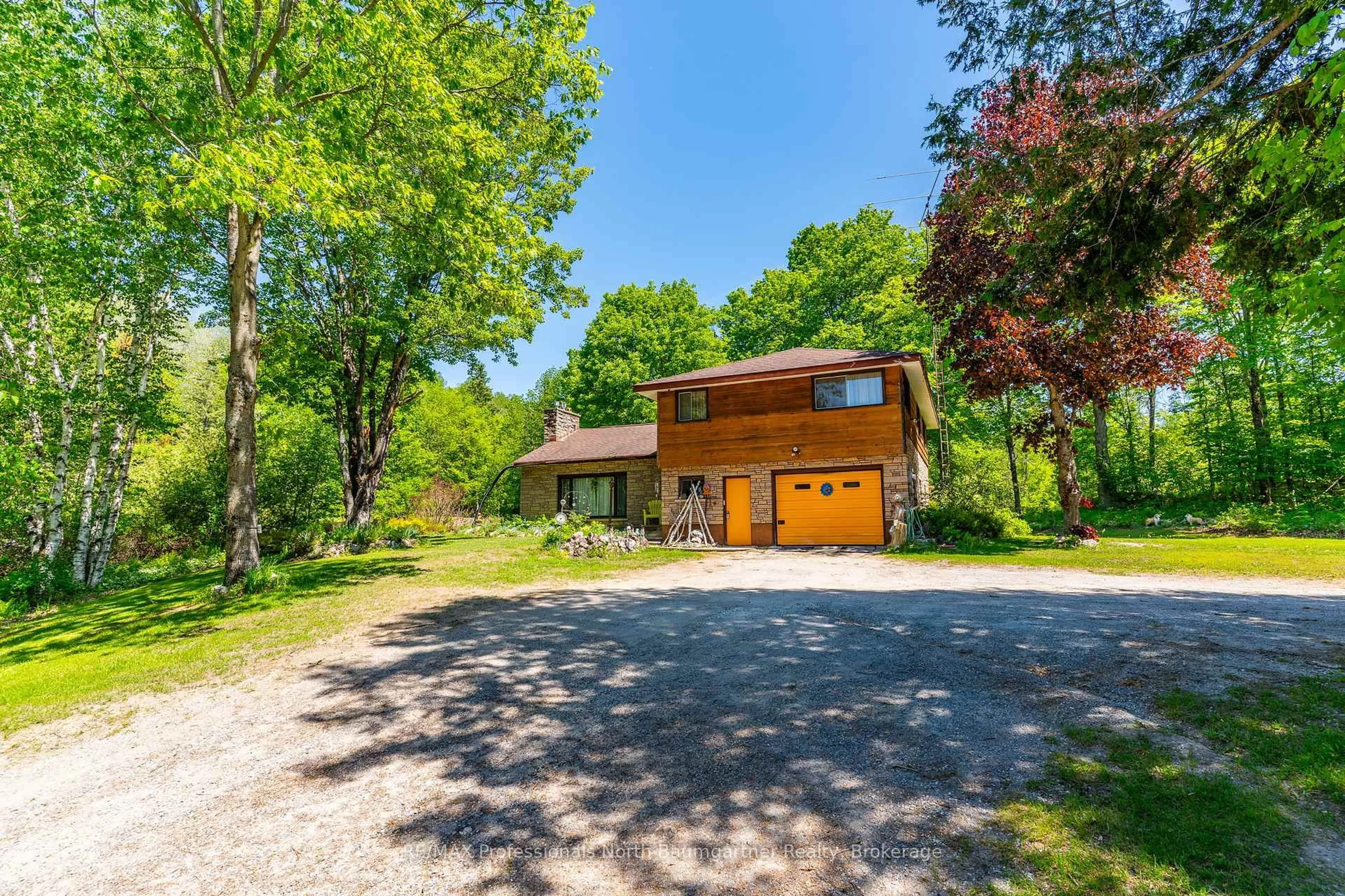 A pic from outside/outdoor area/front of a property/back of a property/a pic from drone, unknown for 12504 Highway 35, Minden Hills Ontario K0M 2K0