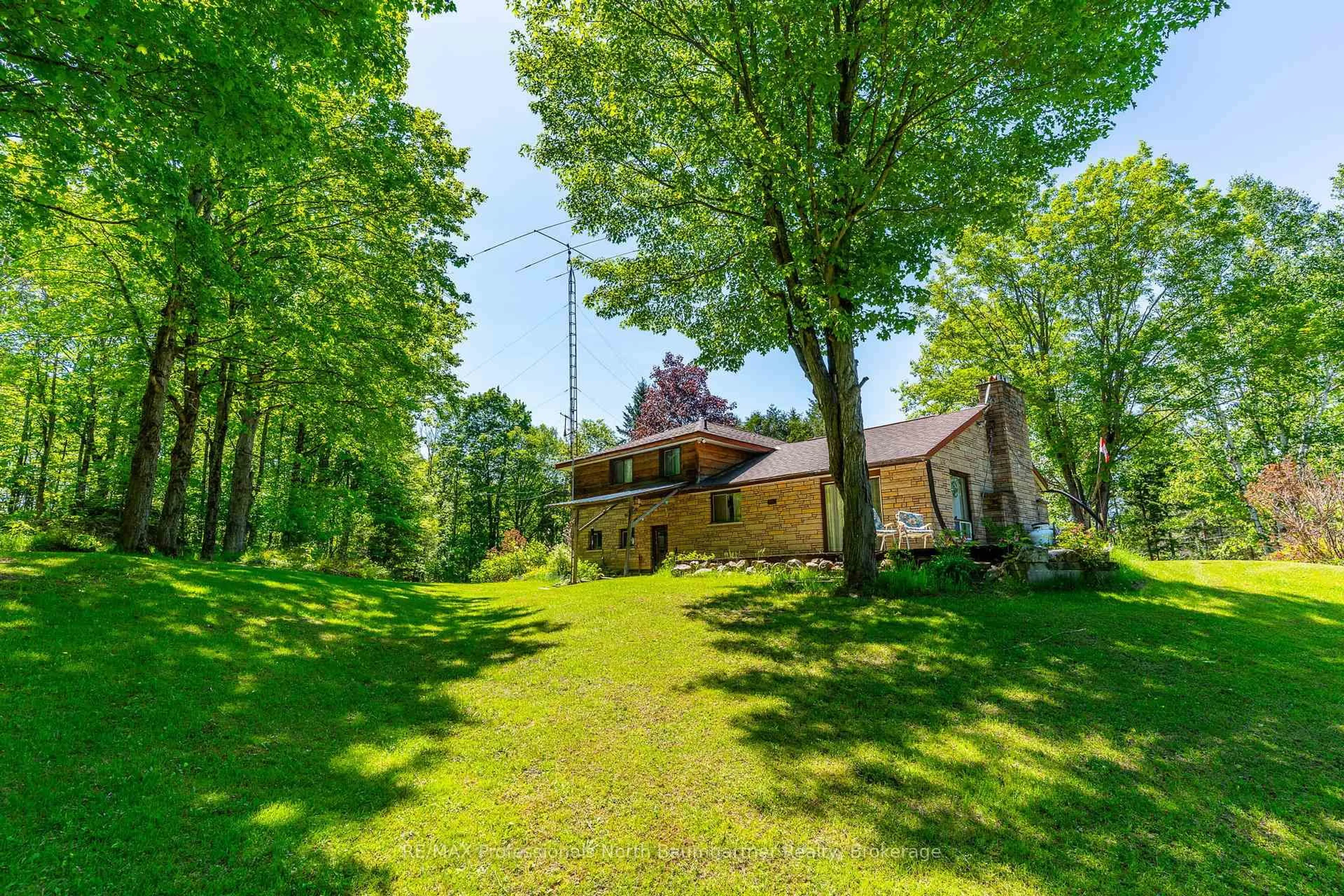 A pic from outside/outdoor area/front of a property/back of a property/a pic from drone, unknown for 12504 Highway 35, Minden Hills Ontario K0M 2K0