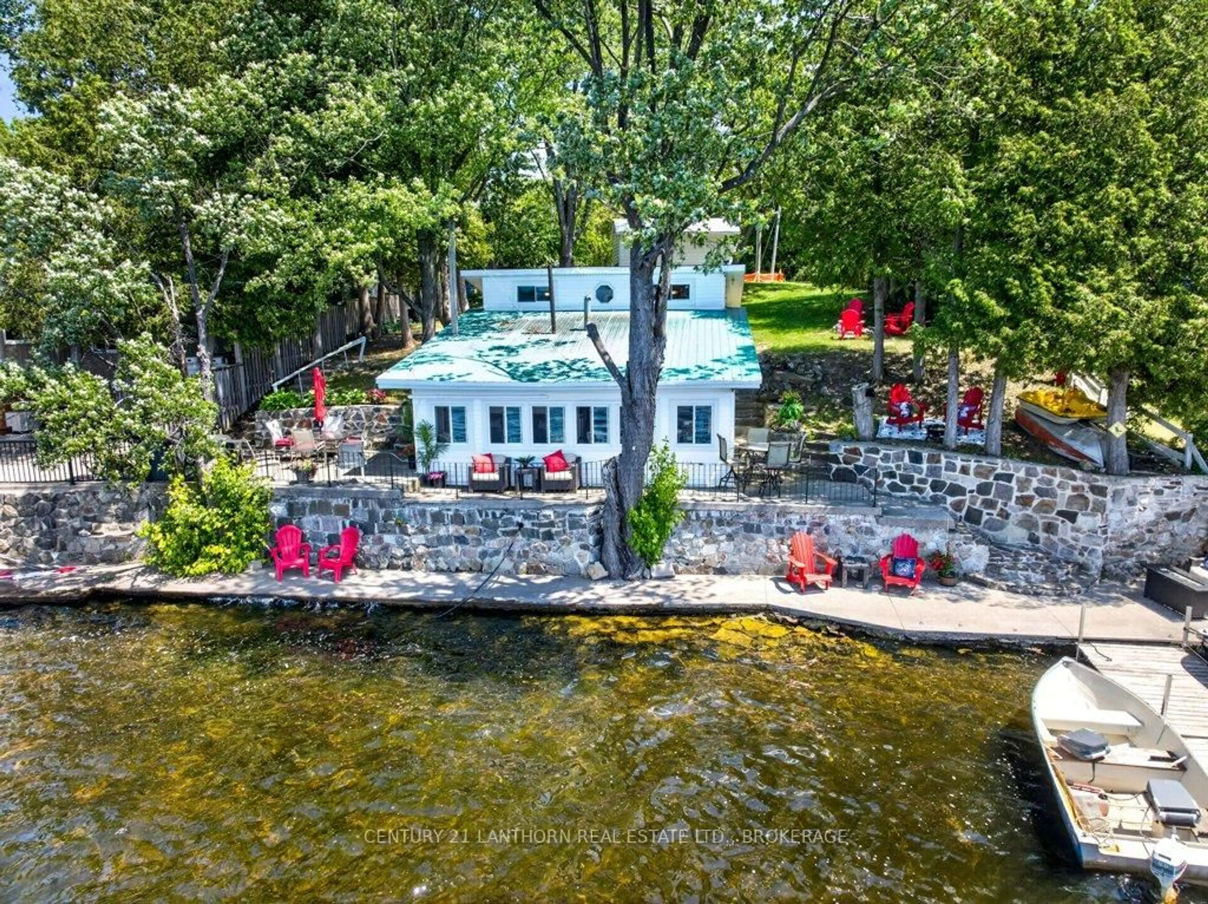 A pic from outside/outdoor area/front of a property/back of a property/a pic from drone, water/lake/river/ocean view for 7 South Shore Dr, Tamworth Ontario K0K 3G0