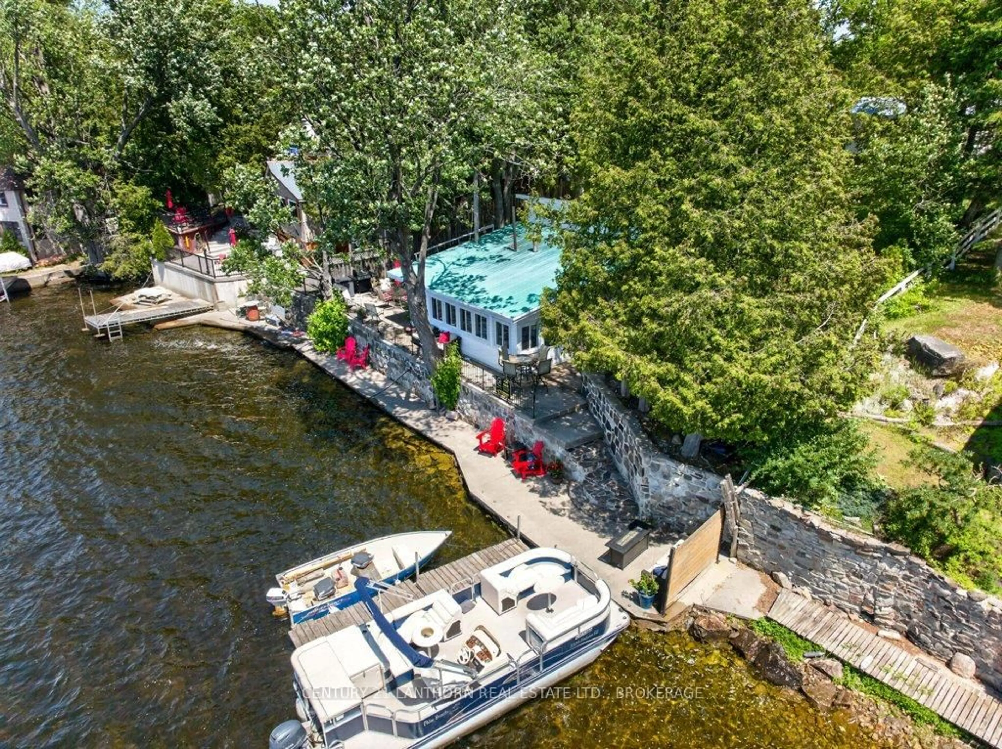 A pic from outside/outdoor area/front of a property/back of a property/a pic from drone, water/lake/river/ocean view for 7 South Shore Dr, Tamworth Ontario K0K 3G0