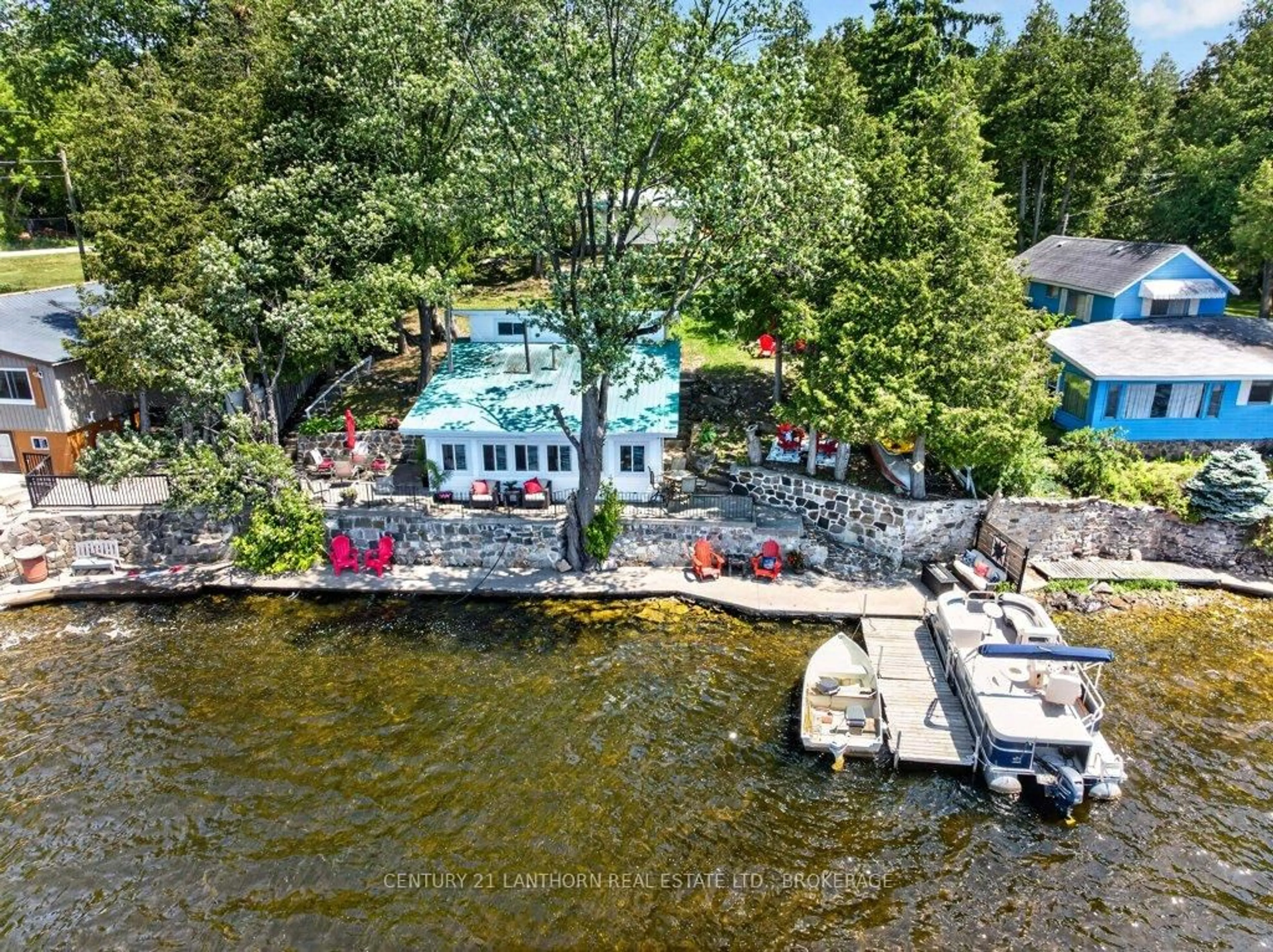 A pic from outside/outdoor area/front of a property/back of a property/a pic from drone, water/lake/river/ocean view for 7 South Shore Dr, Tamworth Ontario K0K 3G0