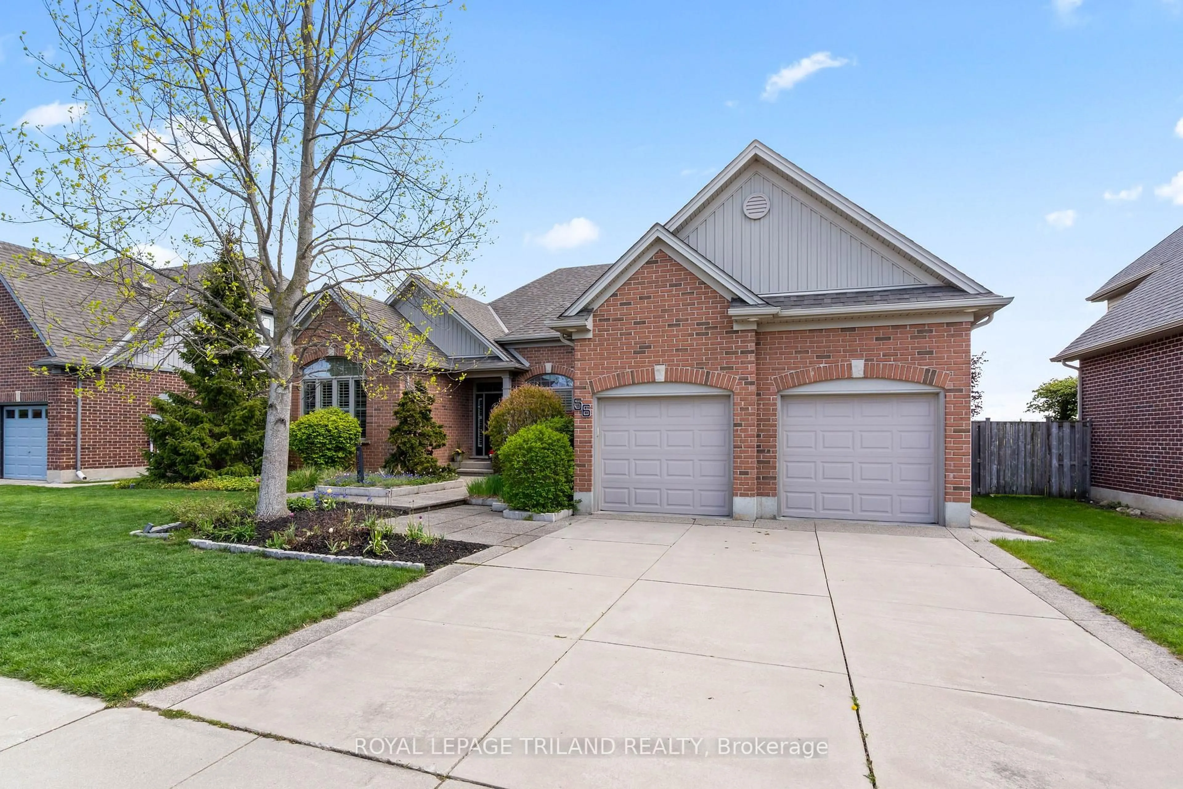 Home with brick exterior material, street for 56 Willow Ridge Rd, Middlesex Centre Ontario N0M 2A0