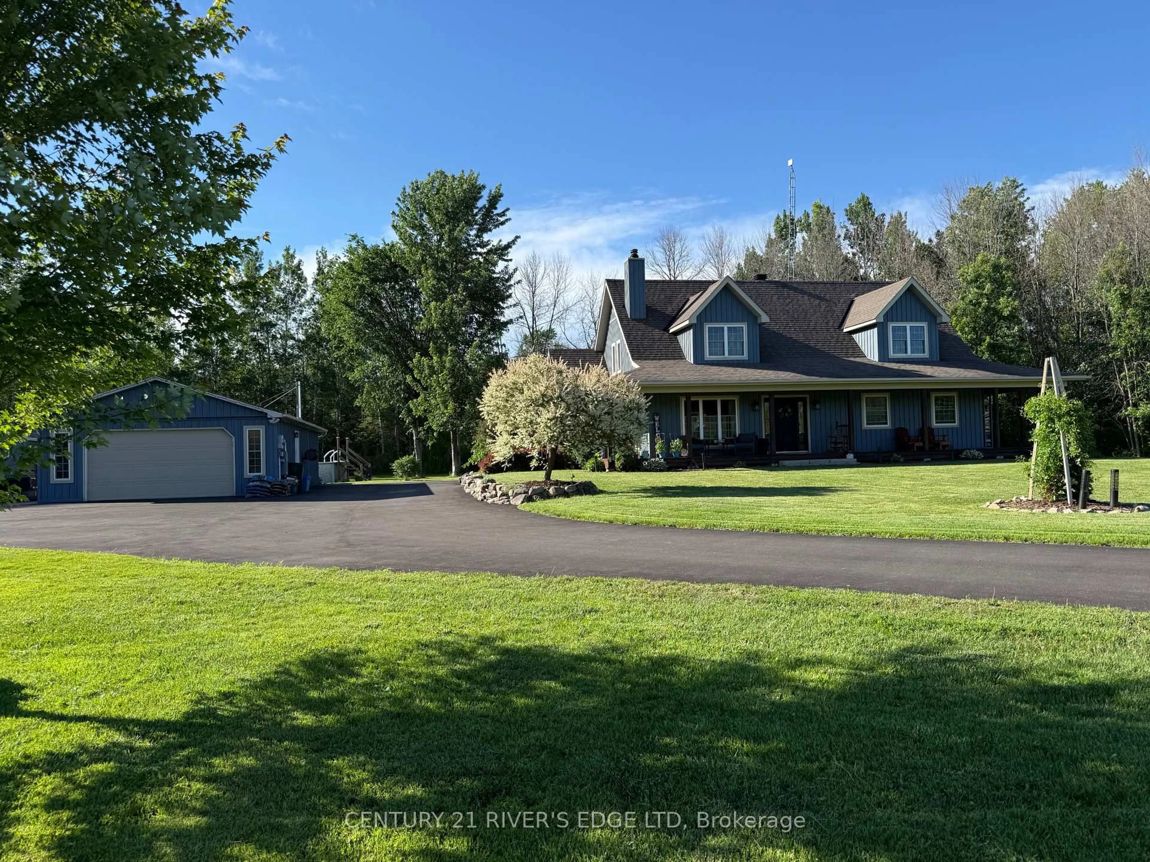 A pic from outside/outdoor area/front of a property/back of a property/a pic from drone, unknown for 13327 County Road 2 Rd, South Dundas Ontario K0C 1X0
