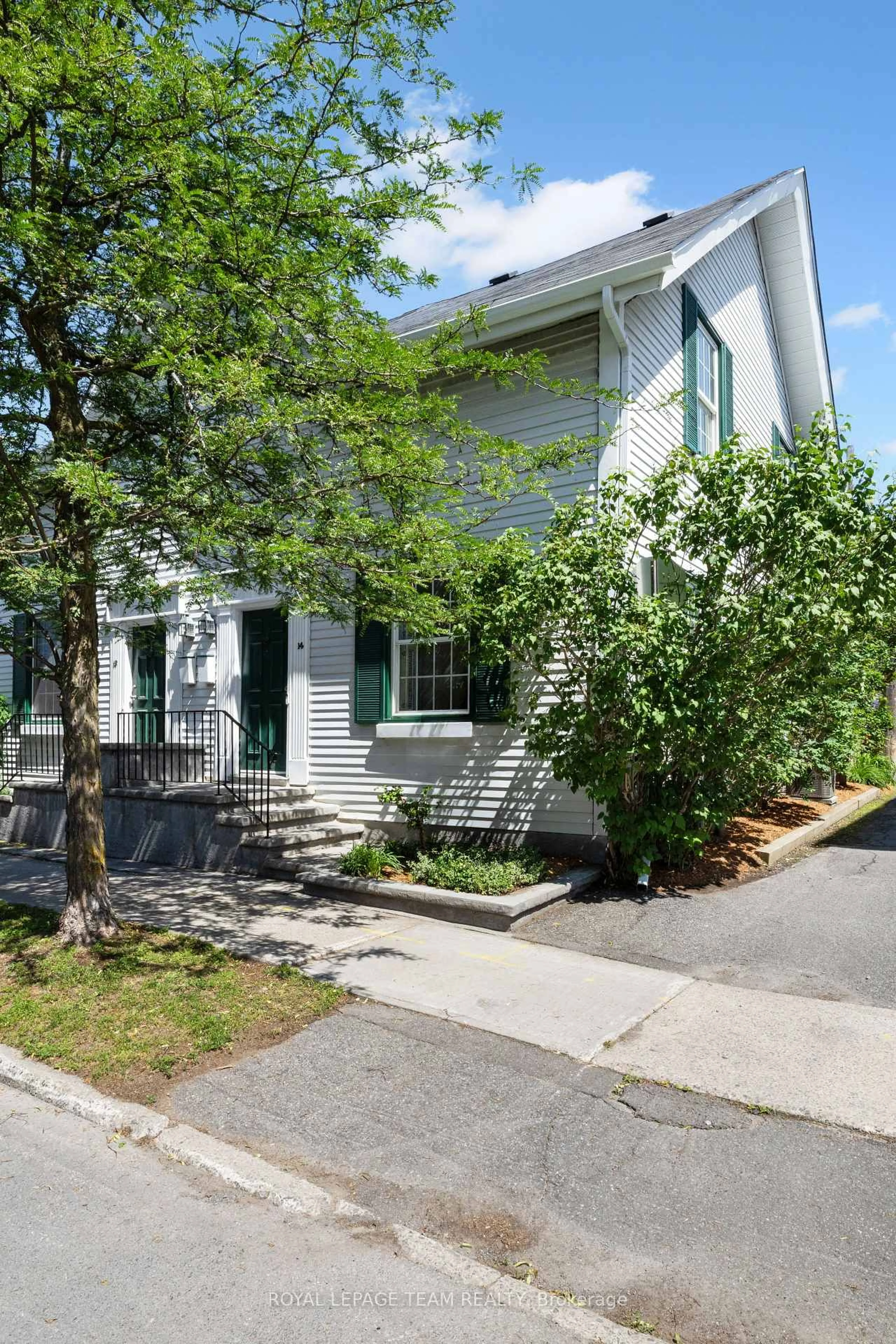 Home with vinyl exterior material, street for 14 Crichton St, Ottawa Ontario K1M 2E2