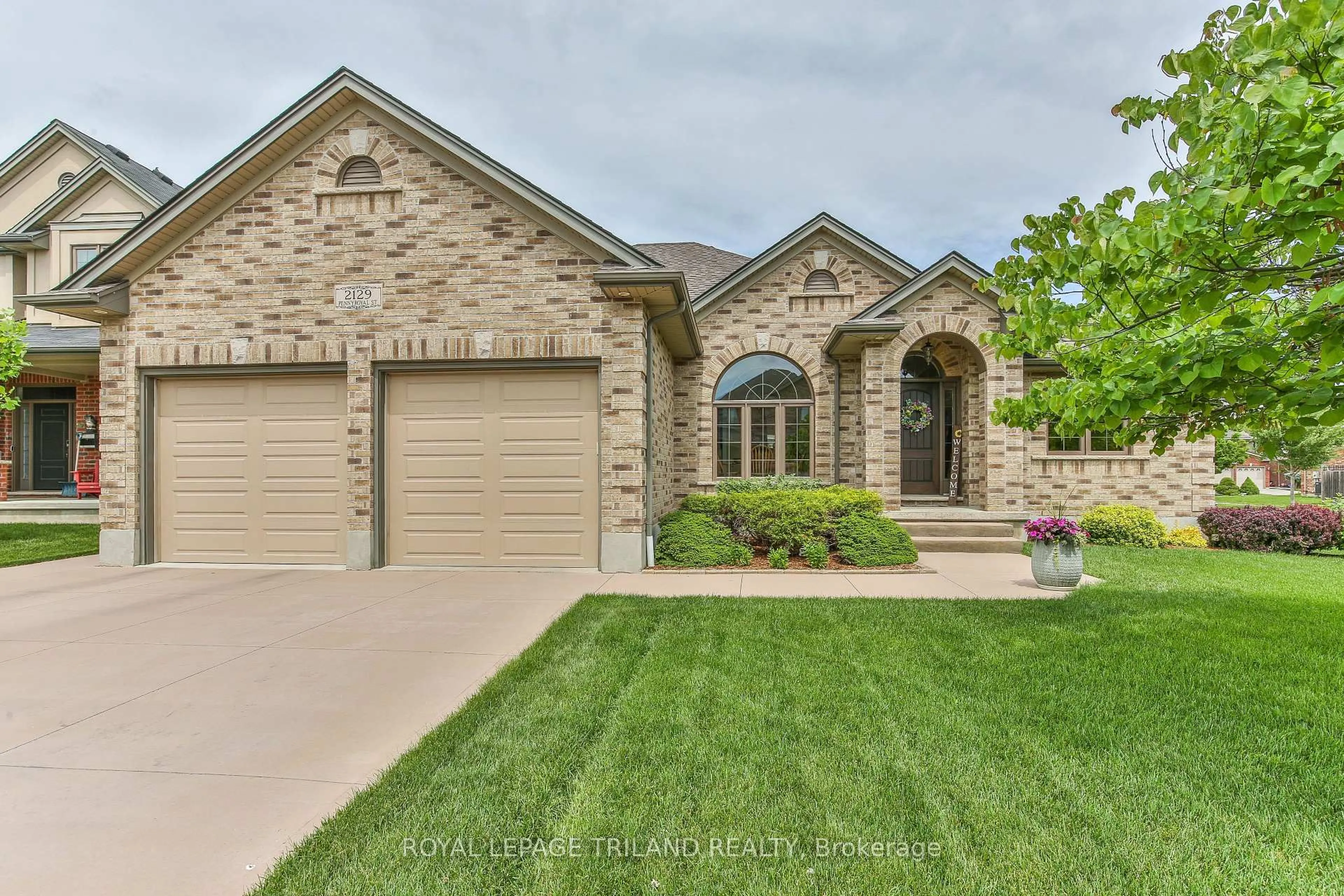 Home with brick exterior material, street for 2129 PENNYROYAL St, London North Ontario N5X 0E7