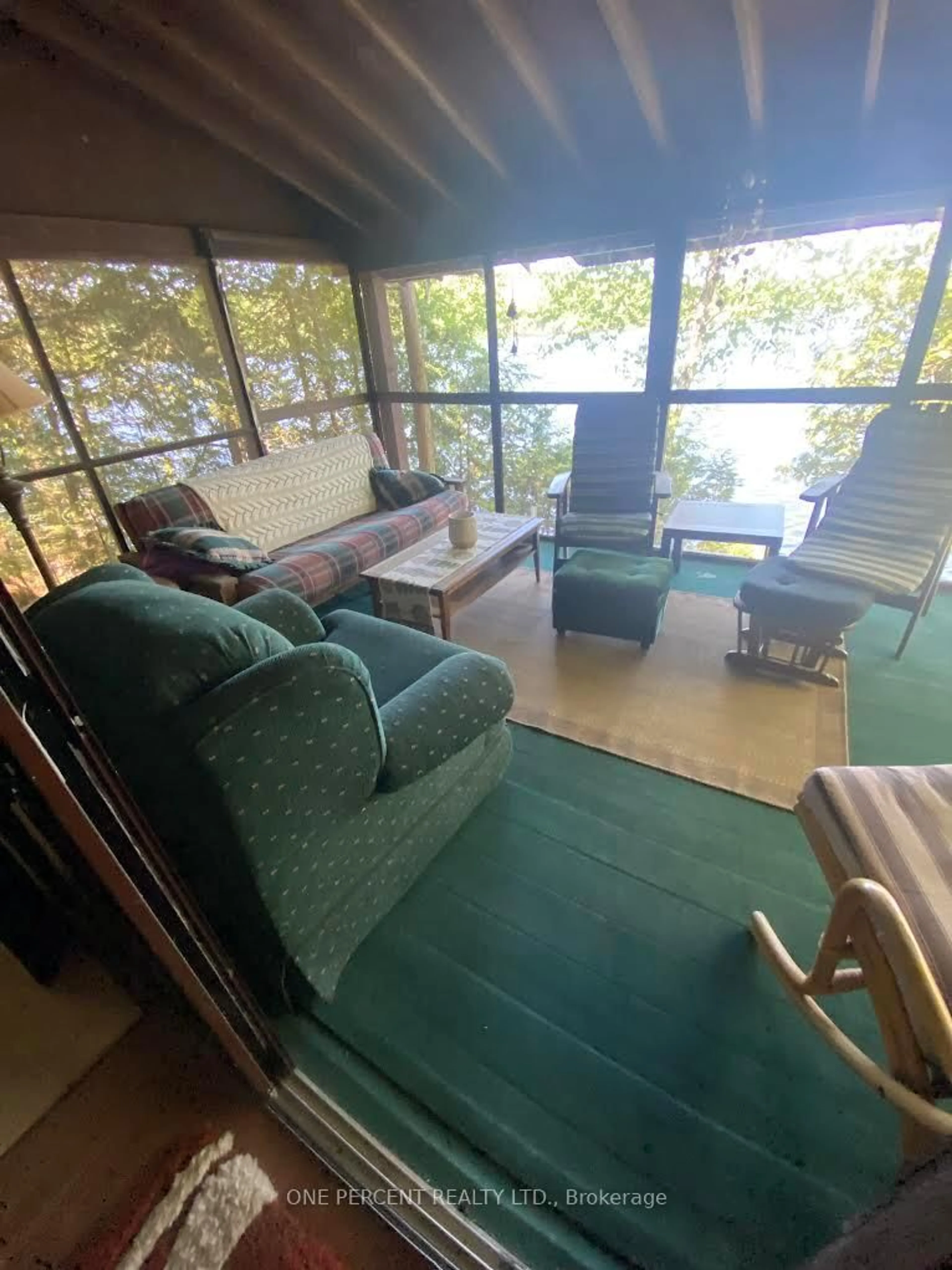 Living room with furniture, unknown for 24 Island A Camp Lake Island, Lake of Bays Ontario P0A 1H0