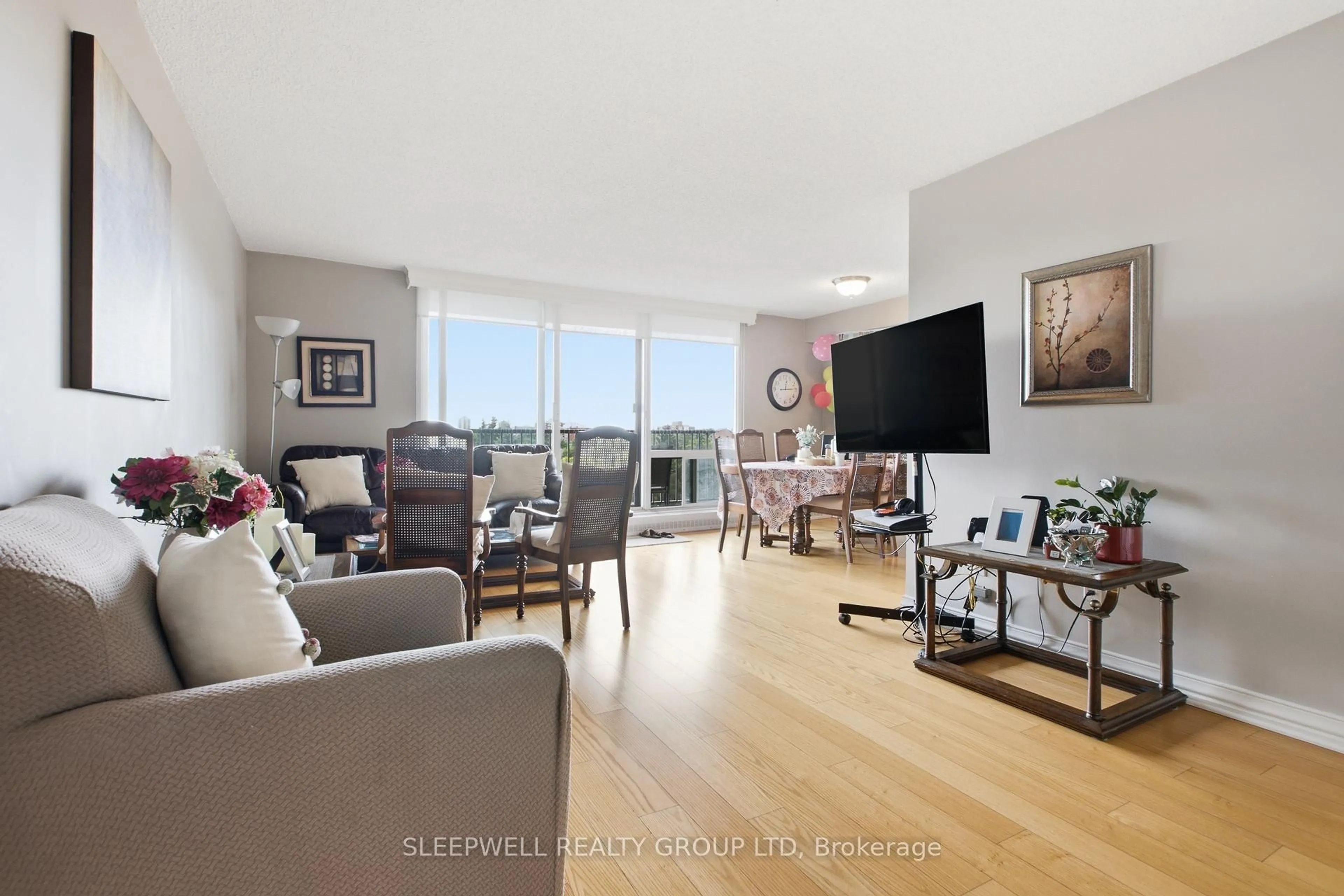 Living room with furniture, unknown for 665 Bathgate Dr #712, Ottawa Ontario K1K 3Y4