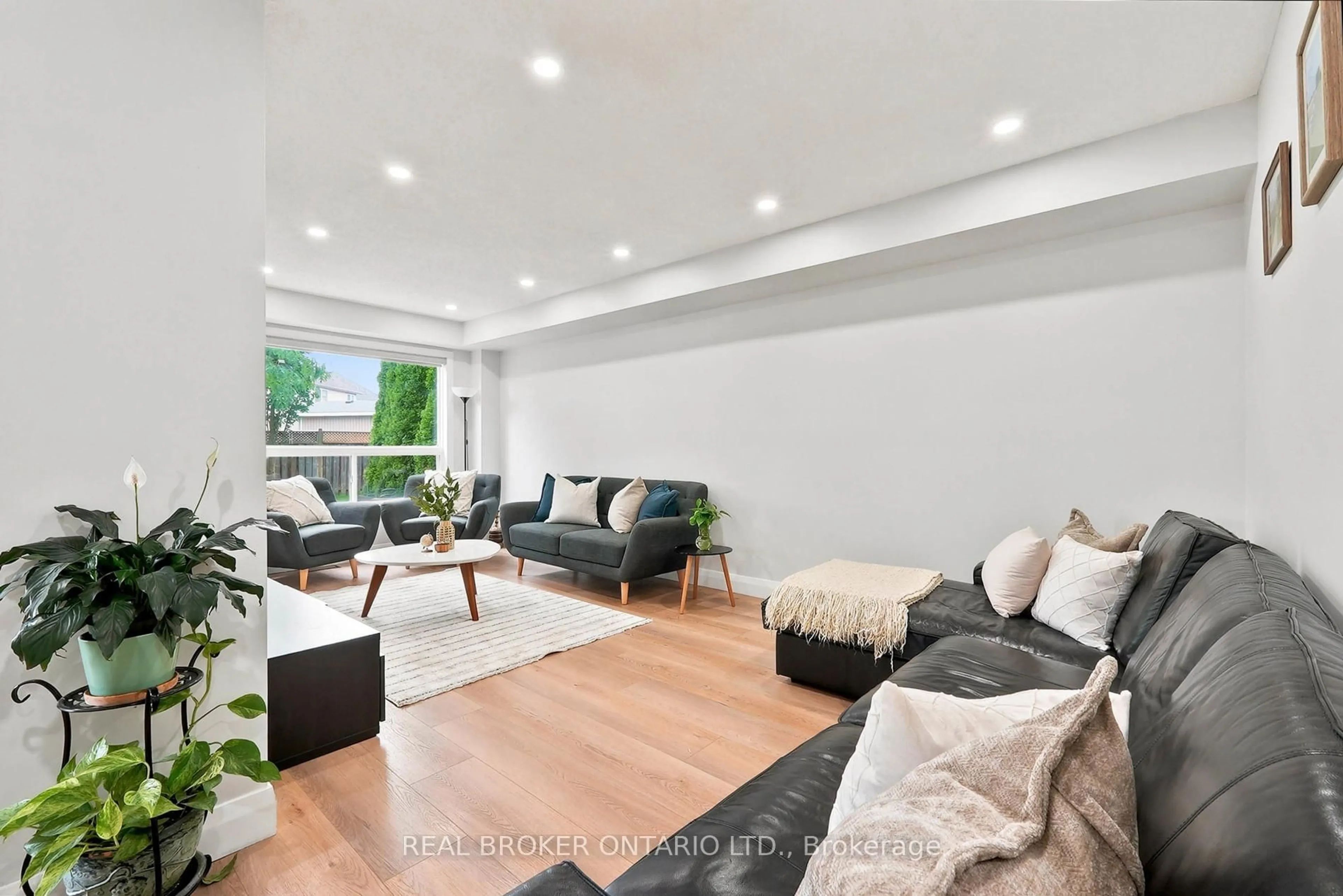 Living room with furniture, wood/laminate floor for 76 Lardner St, Cambridge Ontario N3C 4L2