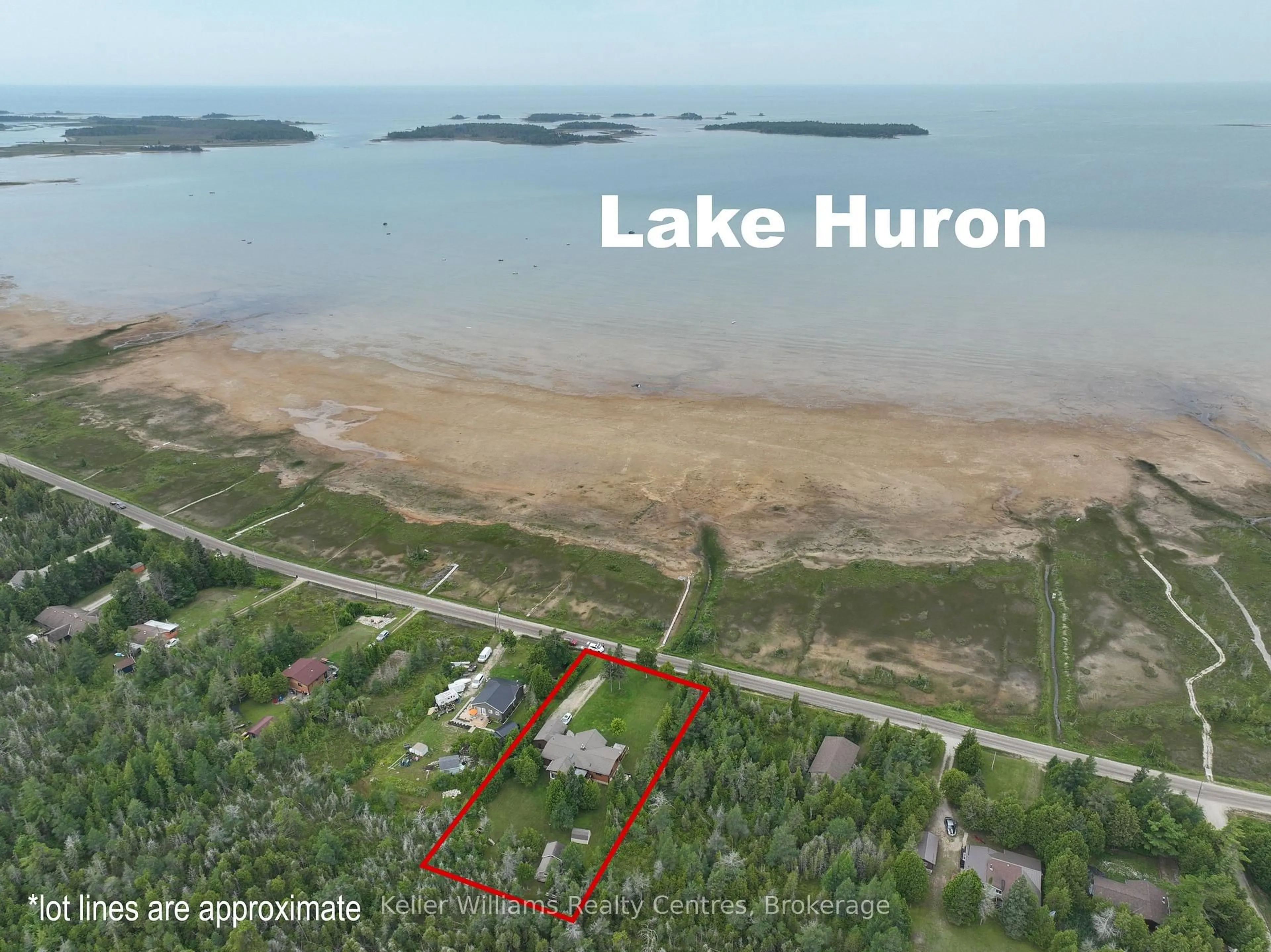 A pic from outside/outdoor area/front of a property/back of a property/a pic from drone, water/lake/river/ocean view for 453 Shoreline Ave, South Bruce Peninsula Ontario N0H 2T0