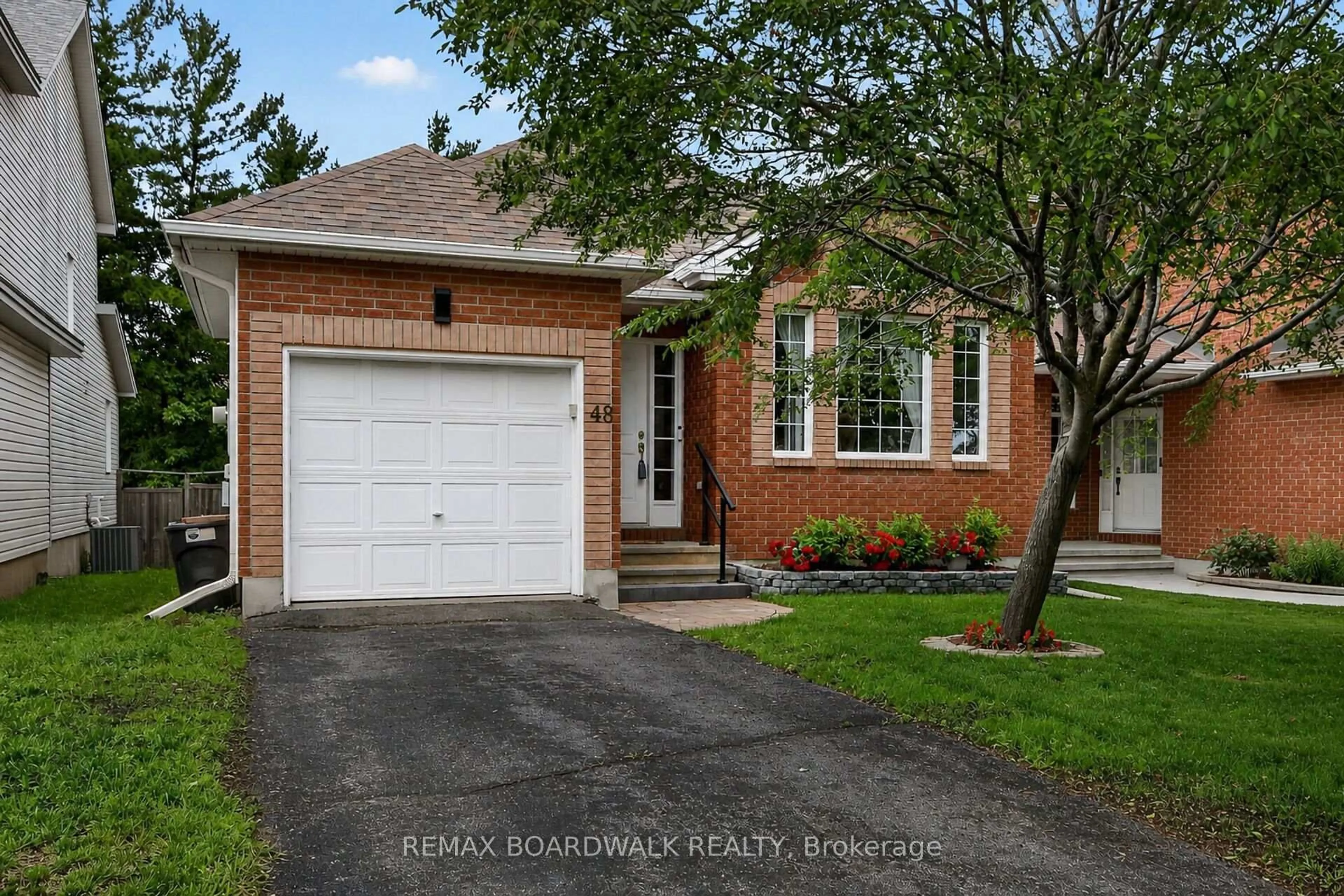 Home with brick exterior material, street for 48 Maricona Way, Ottawa Ontario K2T 1H2