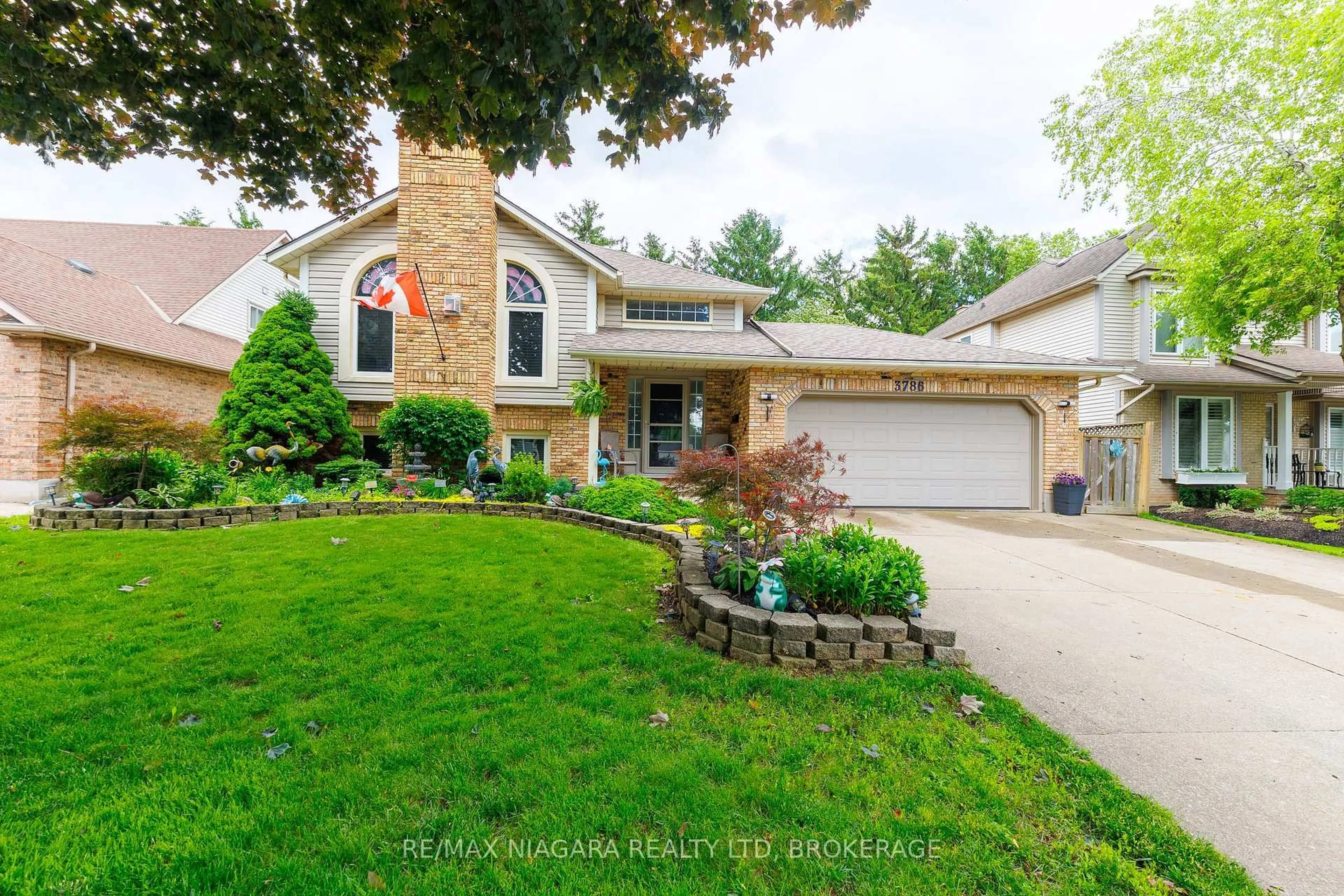Home with brick exterior material, street for 3786 Northwood Dr, Niagara Falls Ontario L2H 2Y5