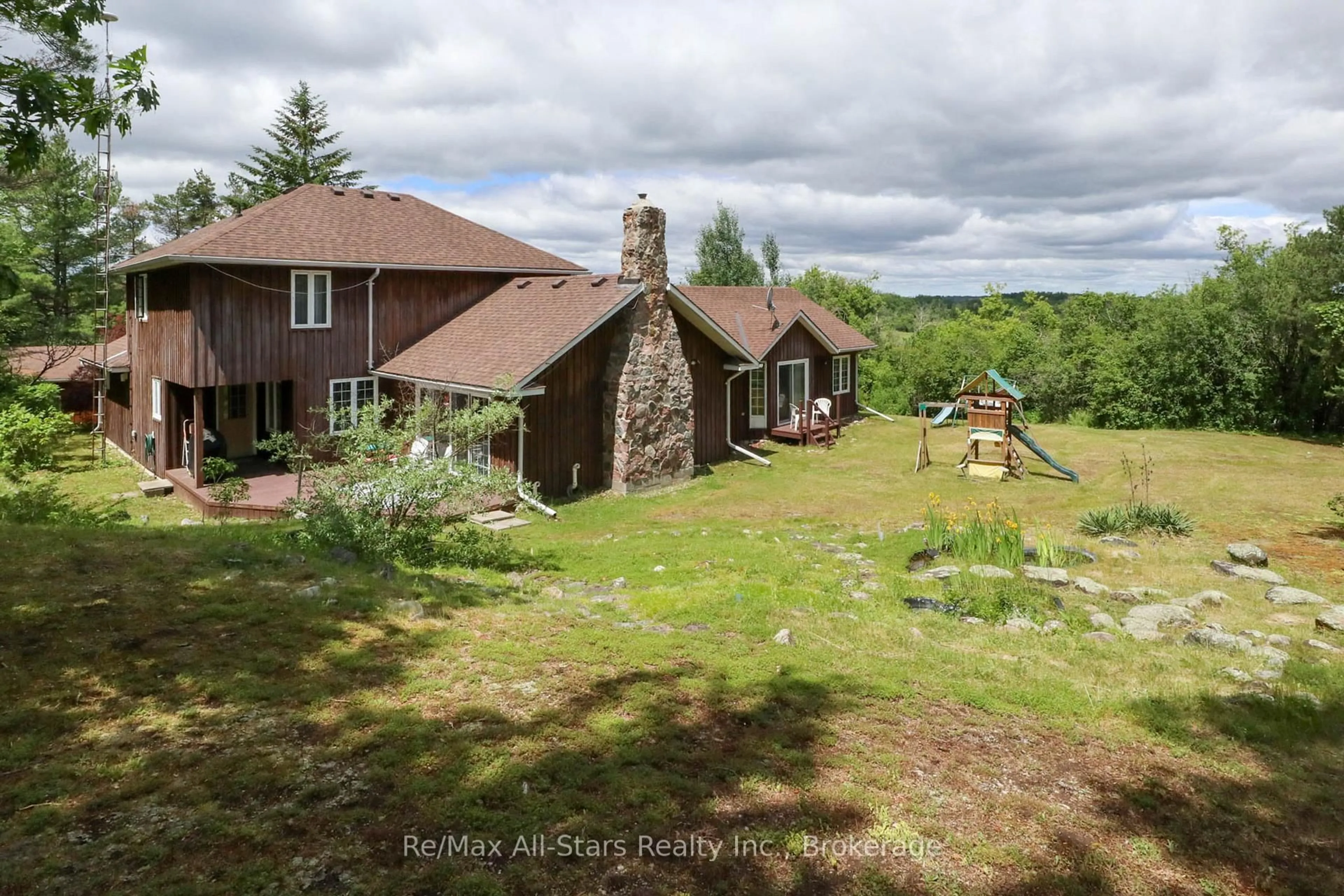 A pic from outside/outdoor area/front of a property/back of a property/a pic from drone, forest/trees view for 1474 Fleetwood Rd, Kawartha Lakes Ontario L0A 1A0