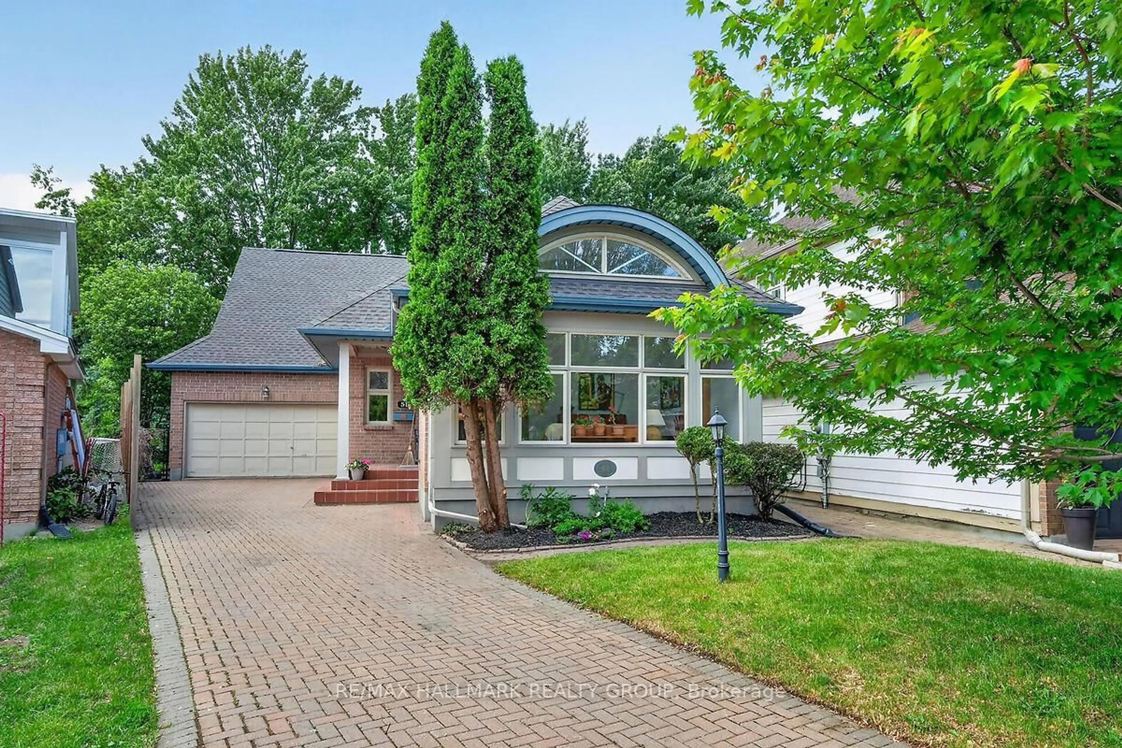 Home with brick exterior material, street for 51 Castlethorpe Cres, Ottawa Ontario K2G 5P9