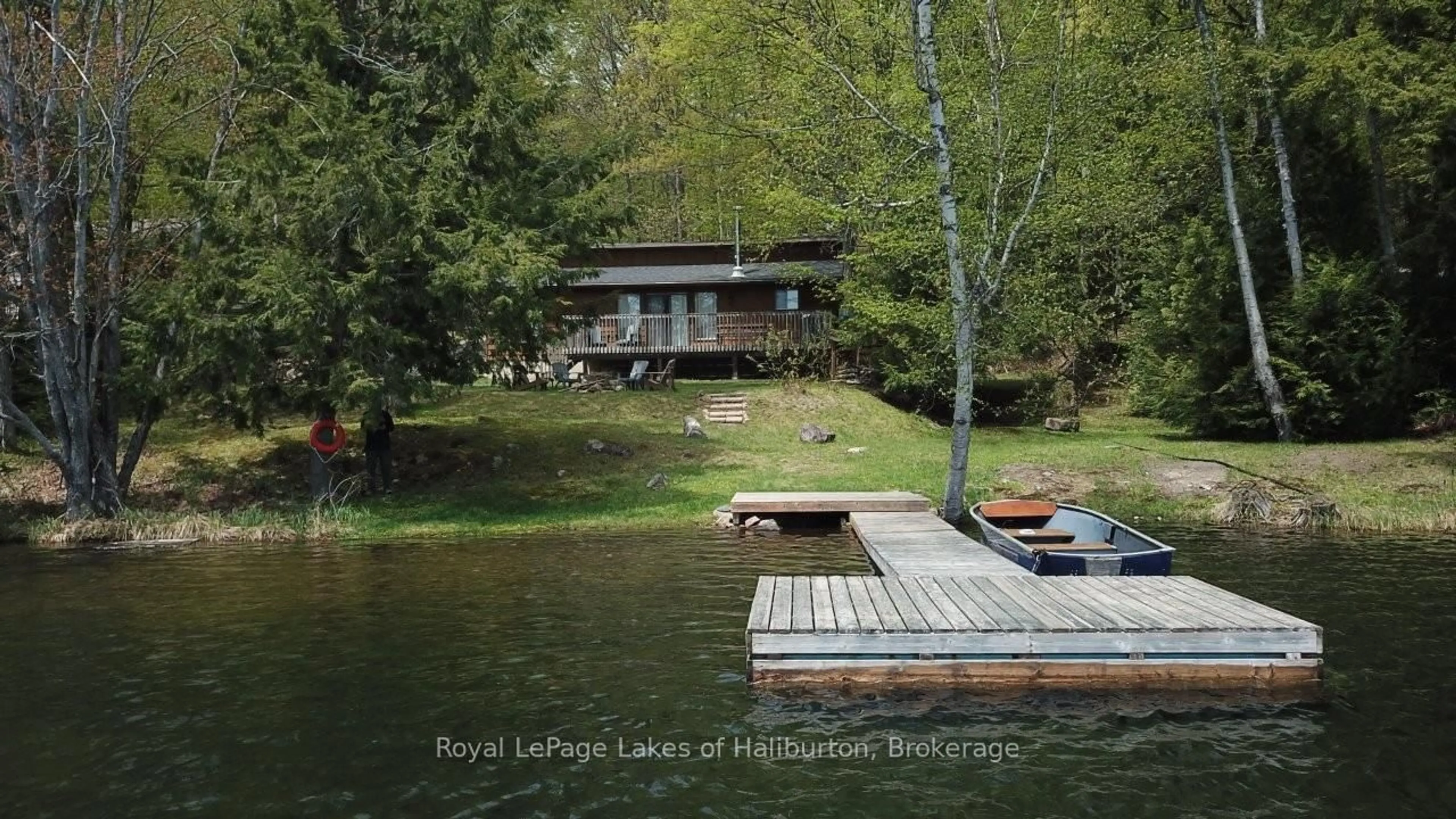 A pic from outside/outdoor area/front of a property/back of a property/a pic from drone, water/lake/river/ocean view for 1214 Lake Lorraine Rd, Highlands East Ontario K0L 2Y0