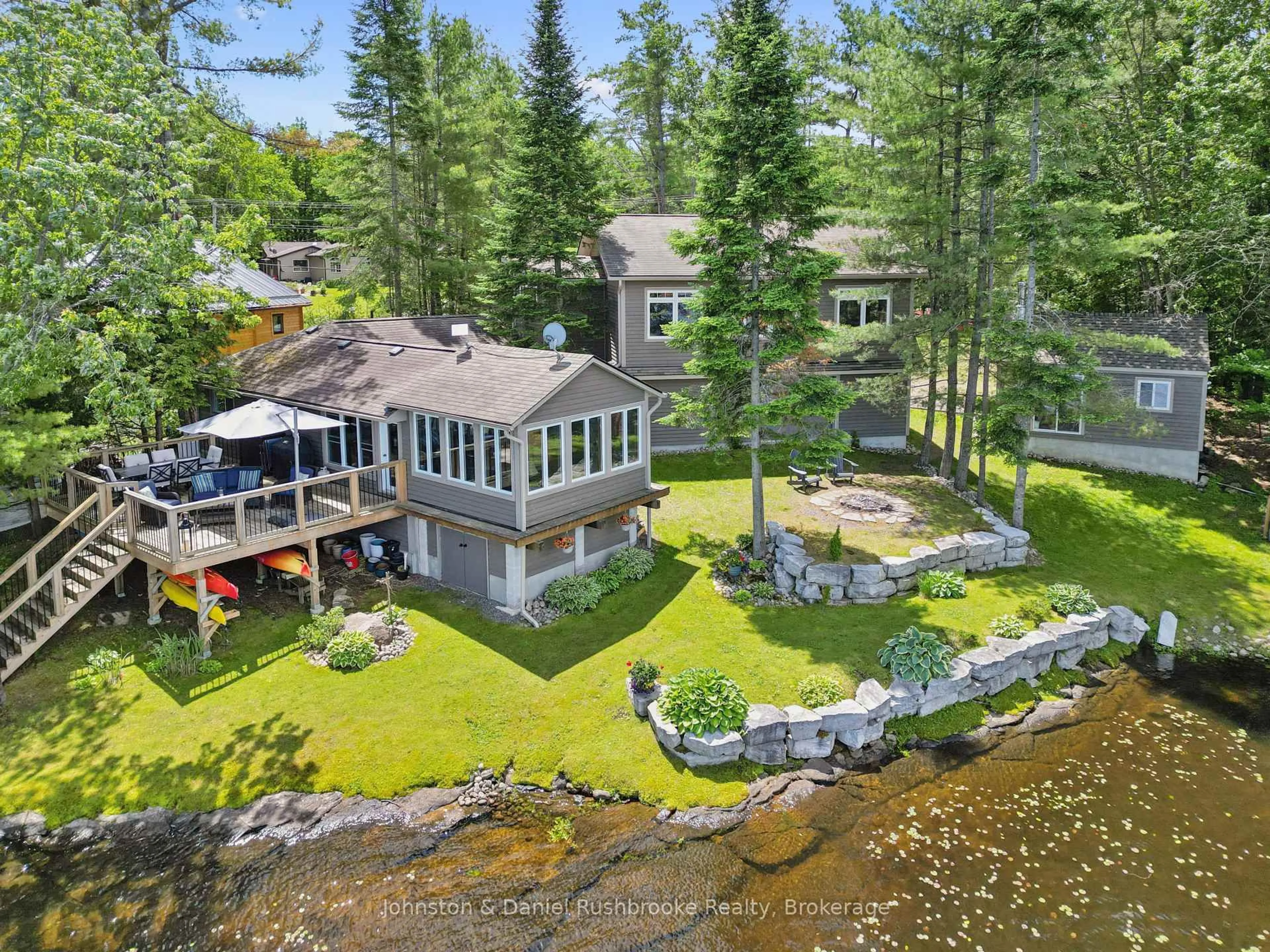 A pic from outside/outdoor area/front of a property/back of a property/a pic from drone, water/lake/river/ocean view for 1164 Morrison Lake Road South, Gravenhurst Ontario P0E 1G0