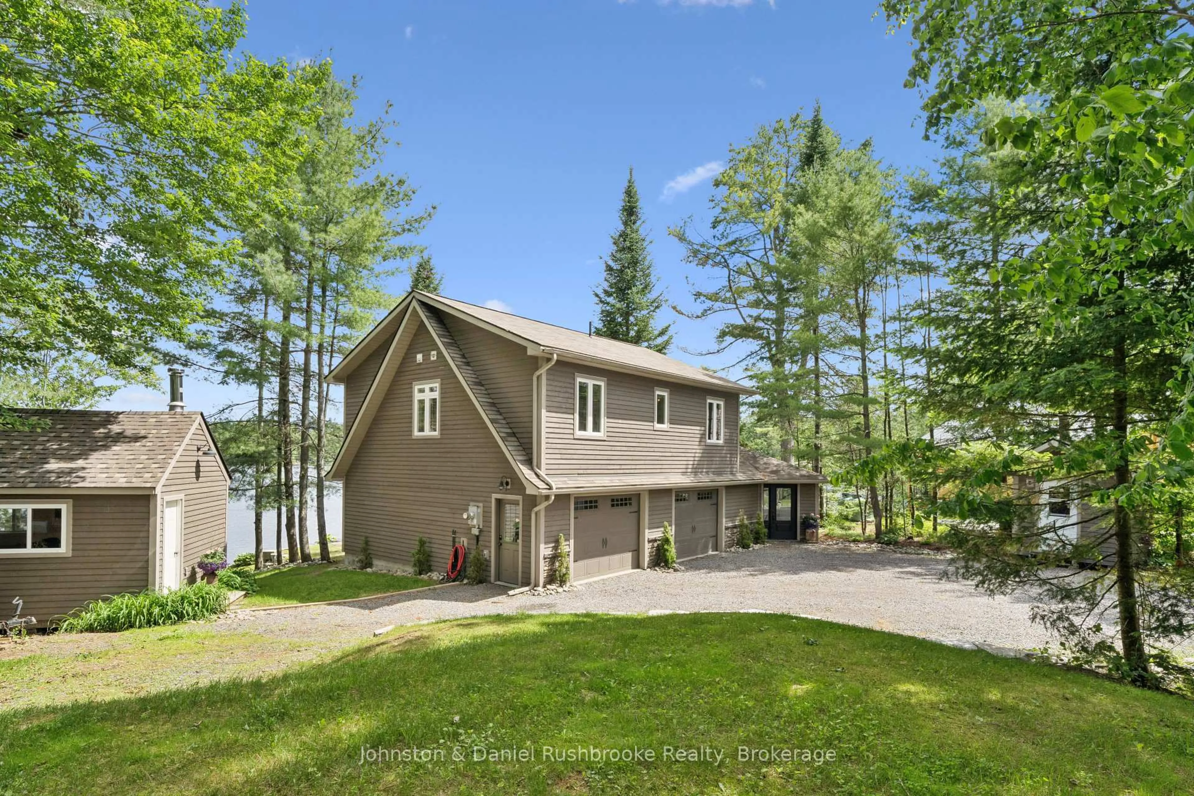 A pic from outside/outdoor area/front of a property/back of a property/a pic from drone, water/lake/river/ocean view for 1164 Morrison Lake Road South, Gravenhurst Ontario P0E 1G0