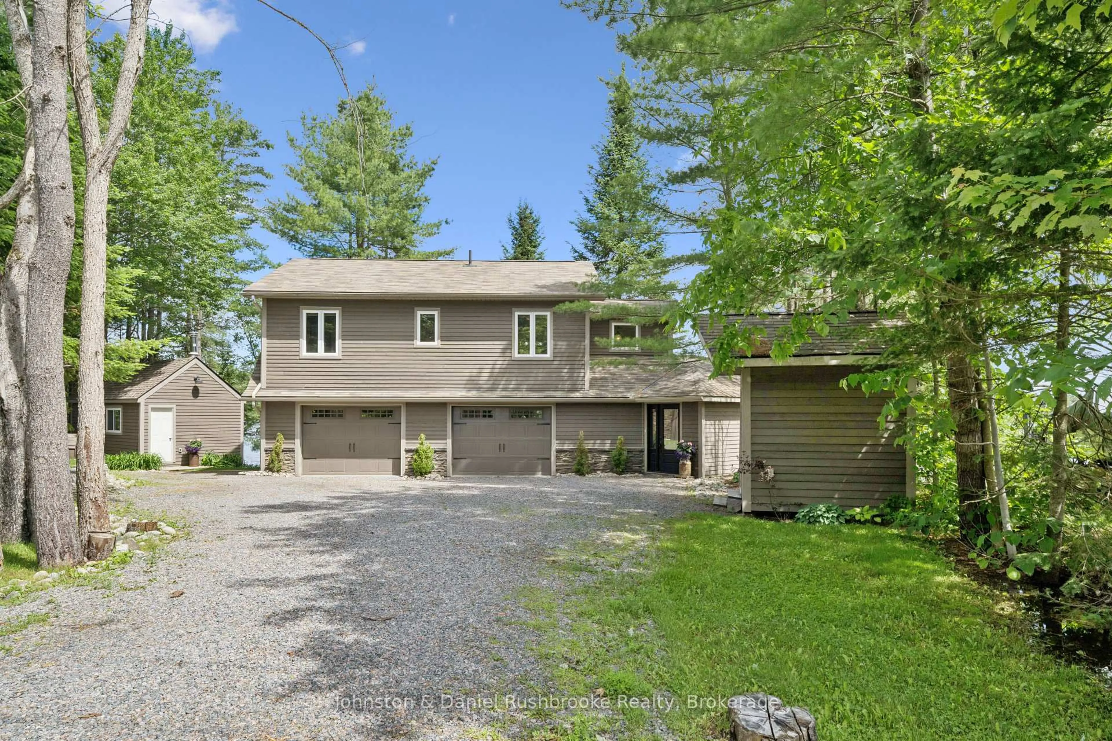 A pic from outside/outdoor area/front of a property/back of a property/a pic from drone, street for 1164 Morrison Lake Road South, Gravenhurst Ontario P0E 1G0
