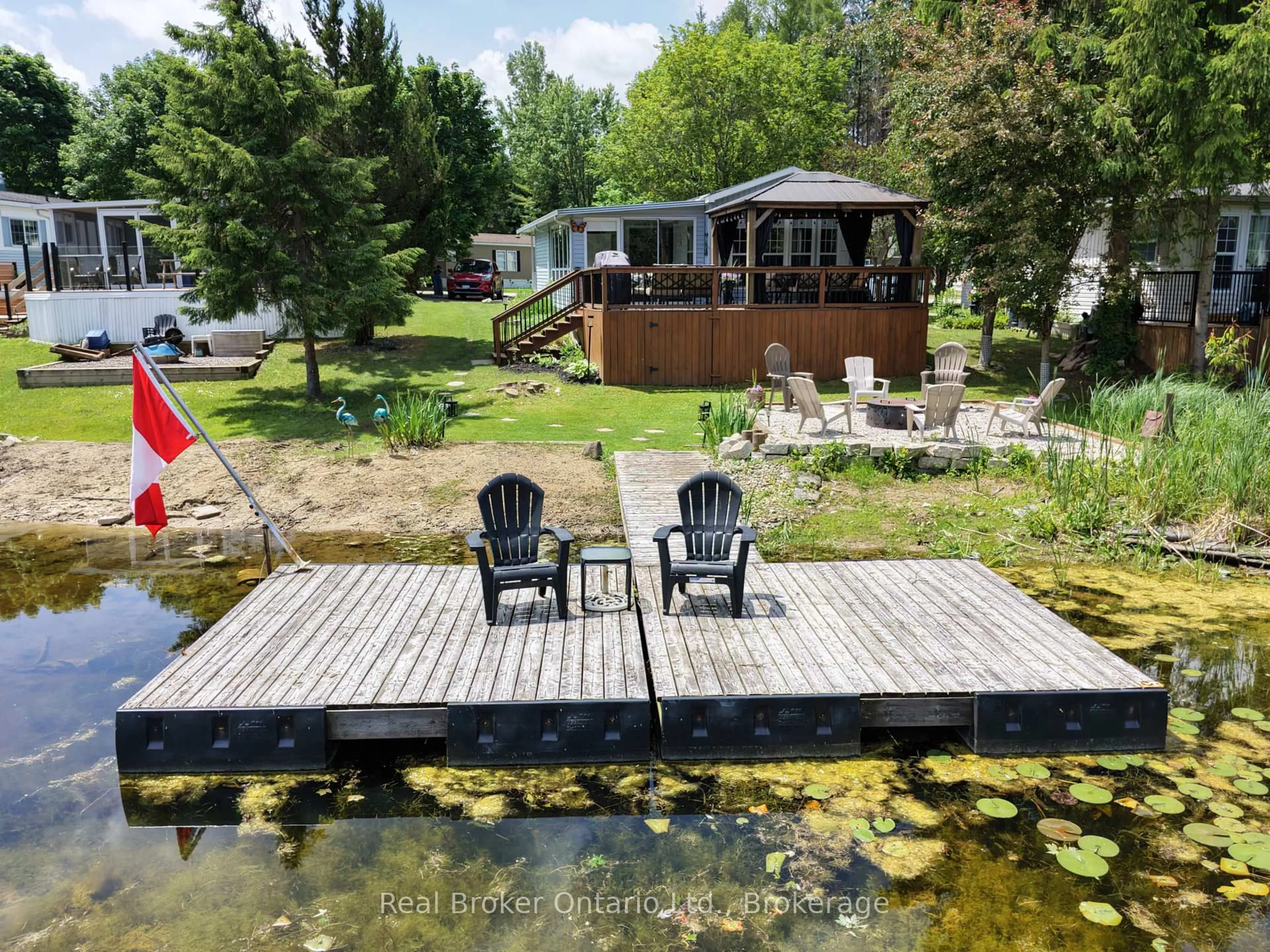 A pic from outside/outdoor area/front of a property/back of a property/a pic from drone, water/lake/river/ocean view for 13 Southline Ave #M29, Huron-Kinloss Ontario N0G 0E1