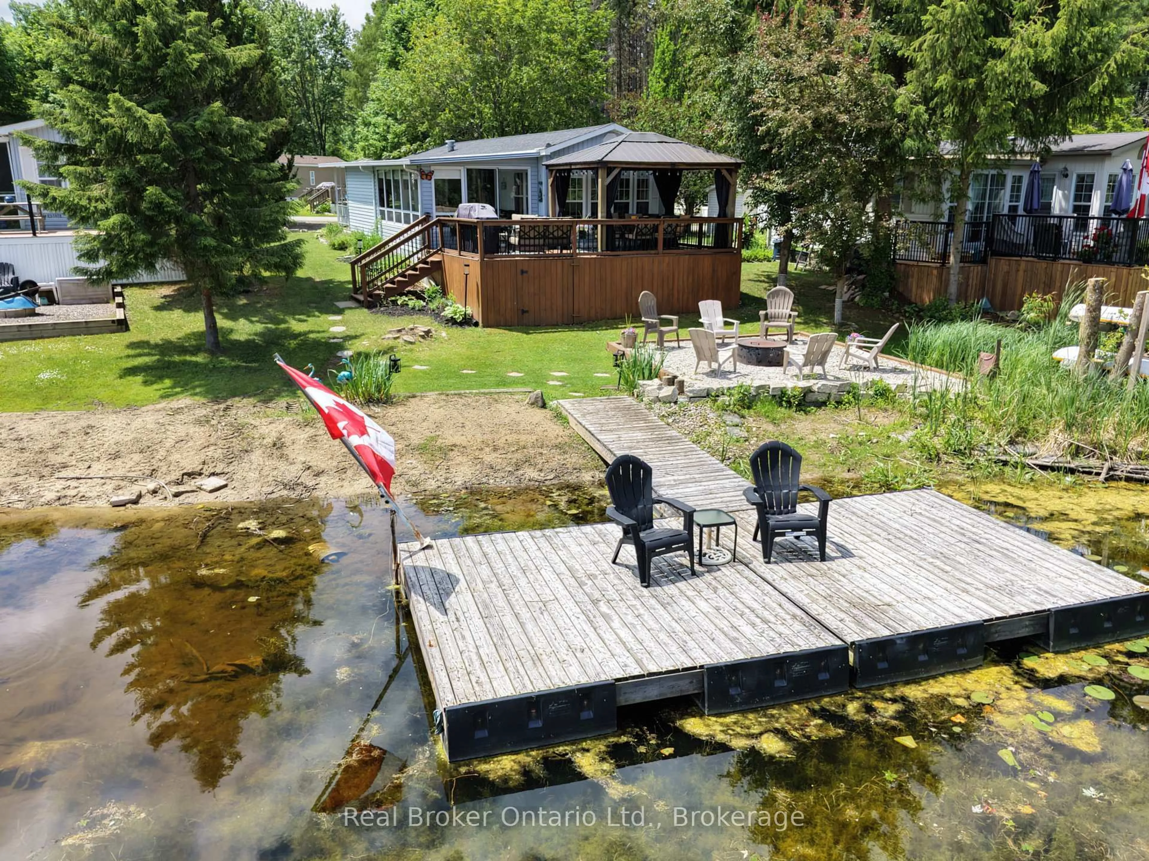 A pic from outside/outdoor area/front of a property/back of a property/a pic from drone, water/lake/river/ocean view for 13 Southline Ave #M29, Huron-Kinloss Ontario N0G 0E1