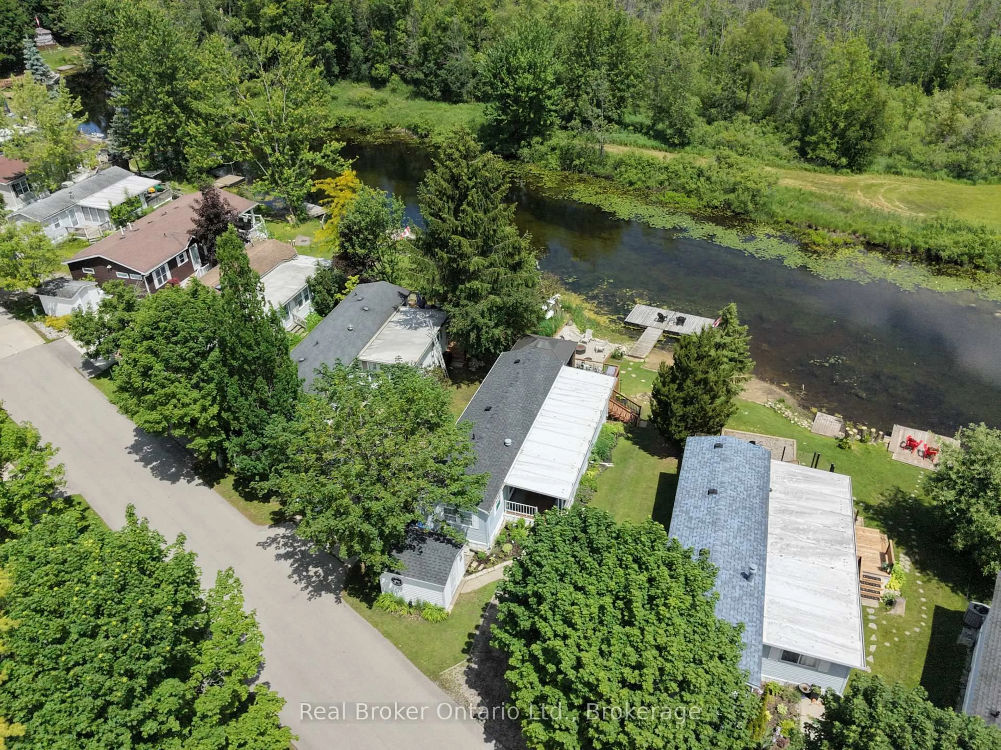 A pic from outside/outdoor area/front of a property/back of a property/a pic from drone, water/lake/river/ocean view for 13 Southline Ave #M29, Huron-Kinloss Ontario N0G 0E1