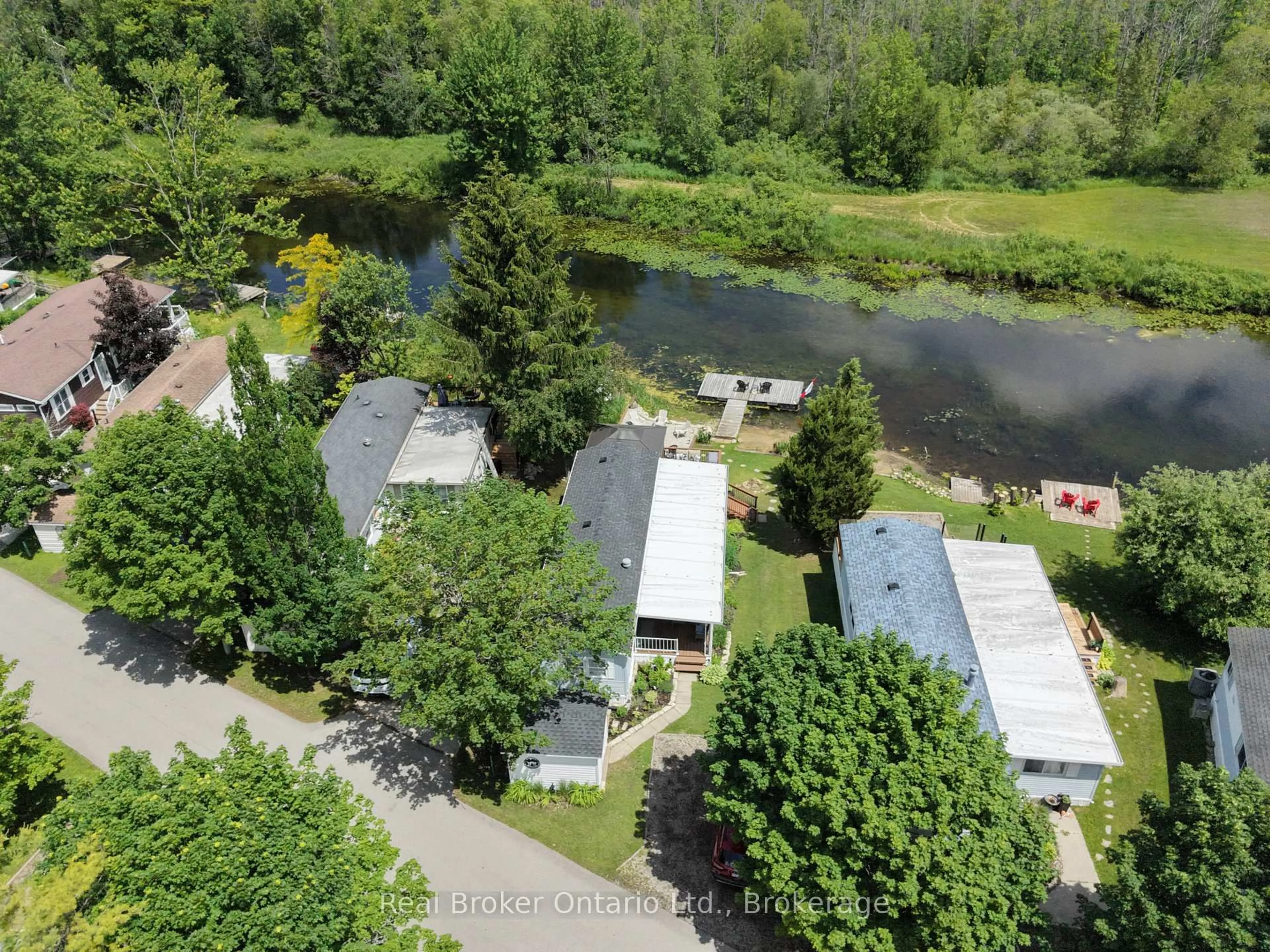 A pic from outside/outdoor area/front of a property/back of a property/a pic from drone, water/lake/river/ocean view for 13 Southline Ave #M29, Huron-Kinloss Ontario N0G 0E1