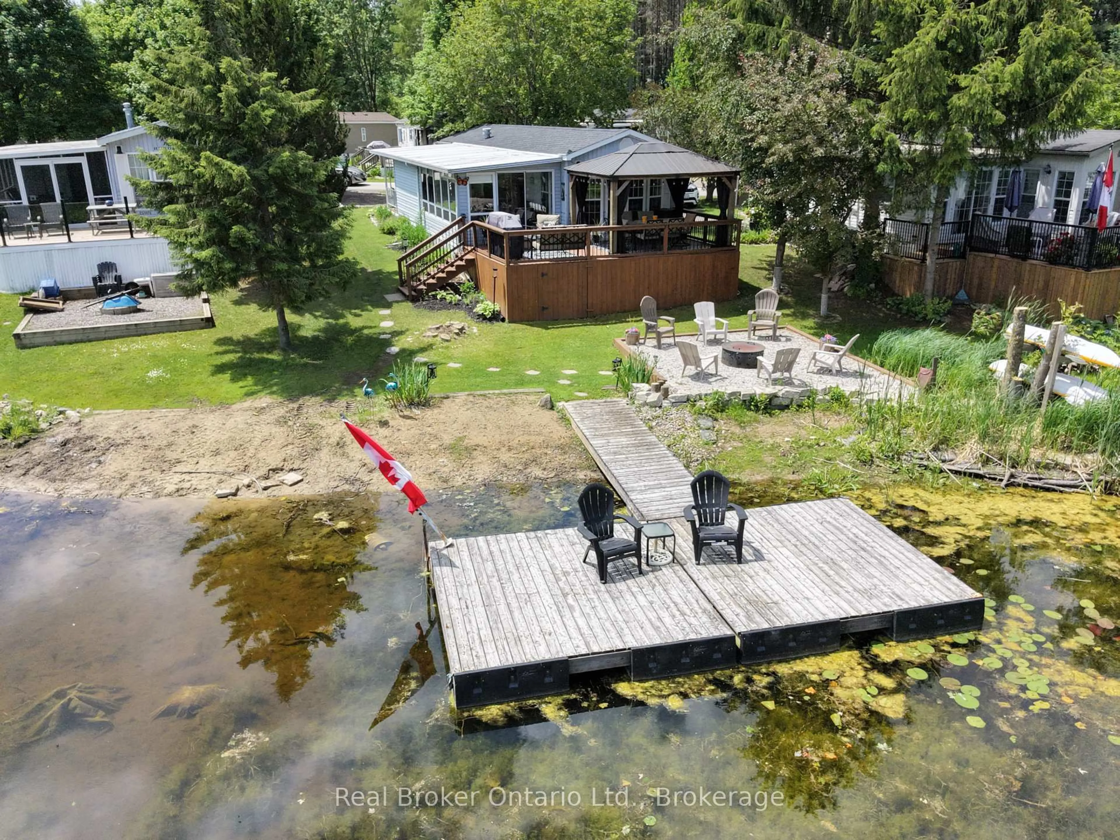 A pic from outside/outdoor area/front of a property/back of a property/a pic from drone, water/lake/river/ocean view for 13 Southline Ave #M29, Huron-Kinloss Ontario N0G 0E1