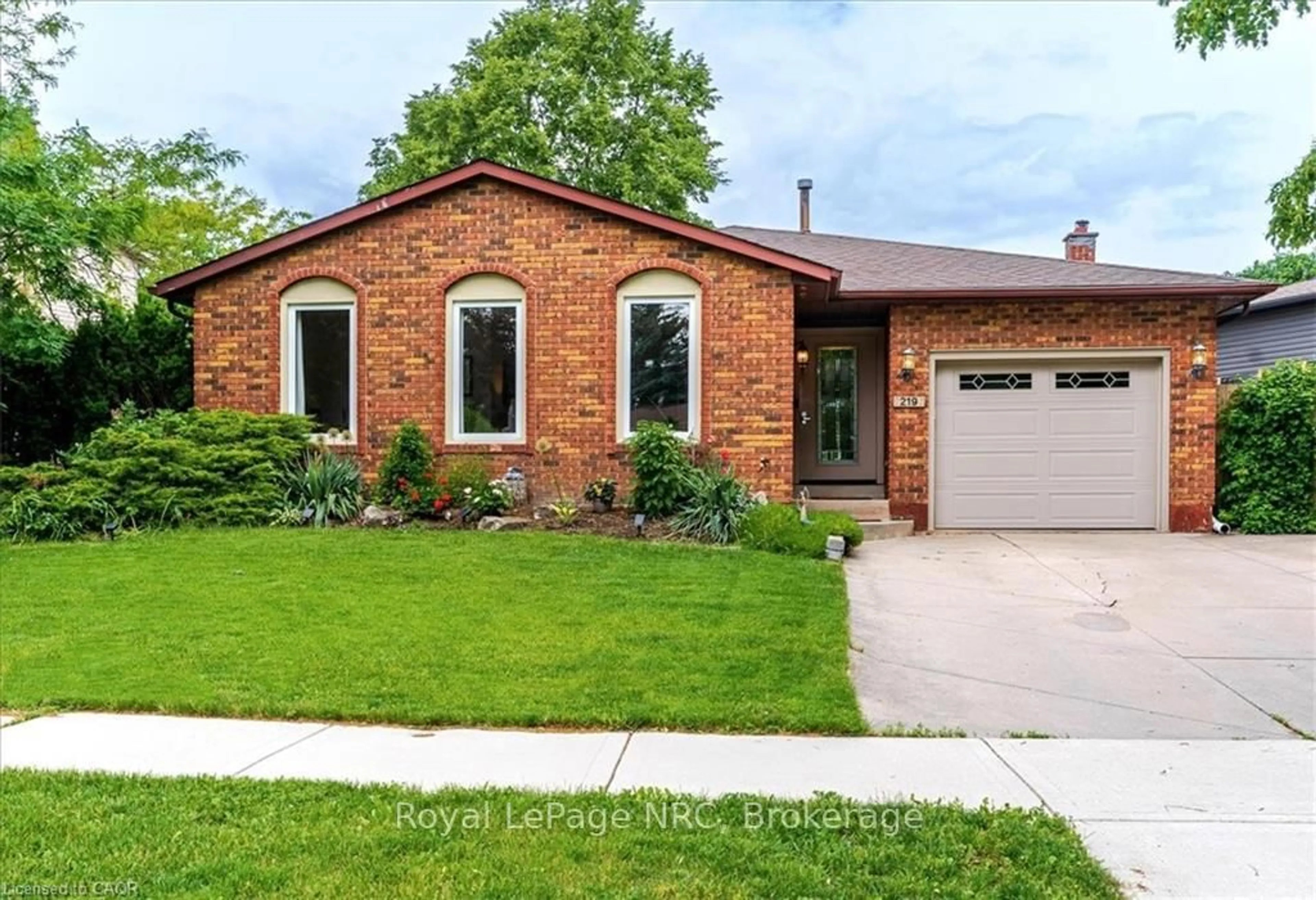 Home with brick exterior material, street for 219 Athenia Dr, Hamilton Ontario L8J 1T6