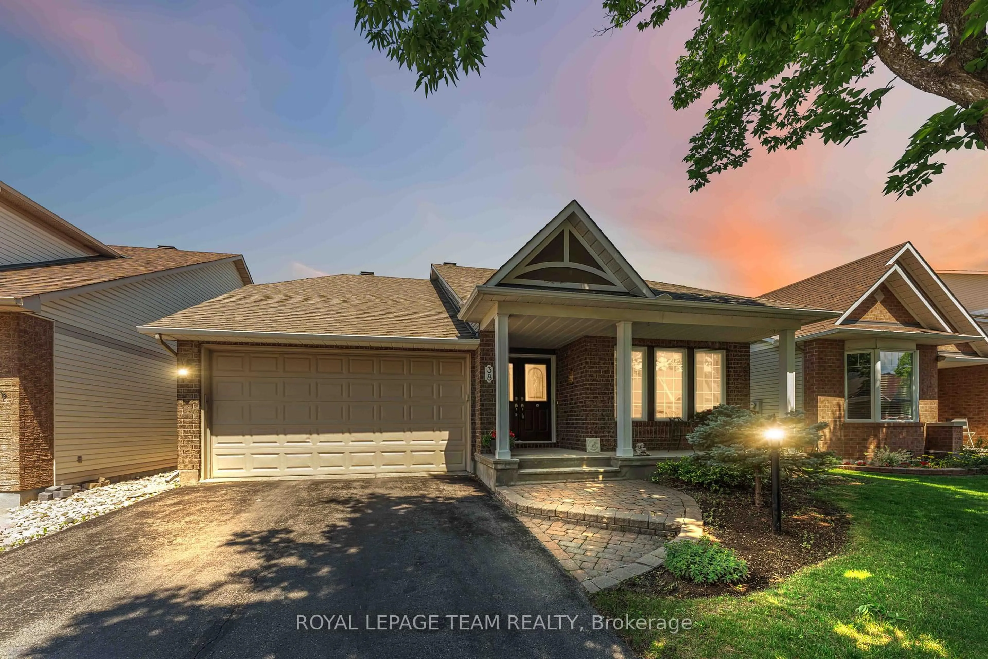 Home with brick exterior material, street for 38 Settler's Ridge Way, Ottawa Ontario K2J 4V2