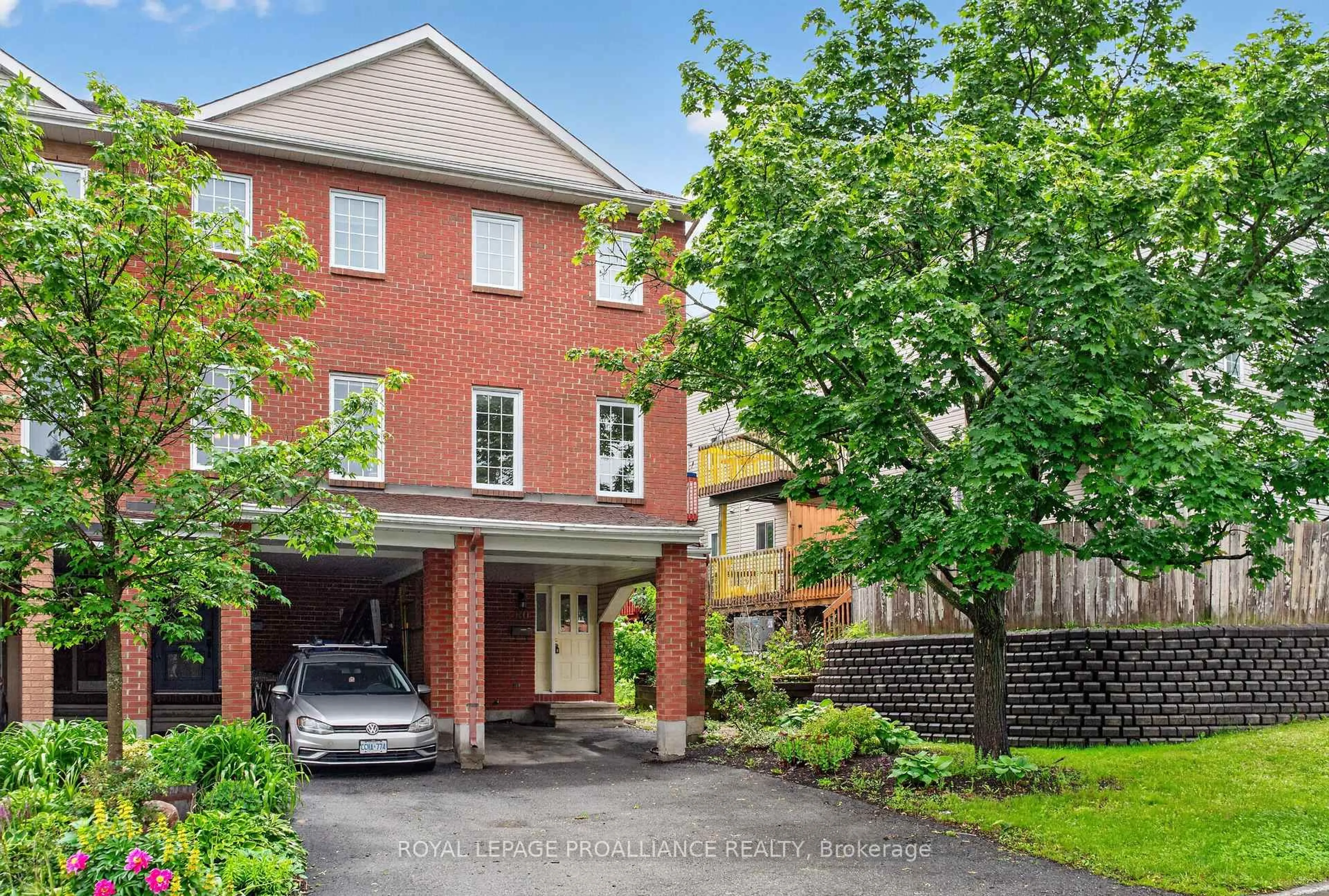 Home with brick exterior material, street for 80 Rothbury Cres, Ottawa Ontario K1K 4N7