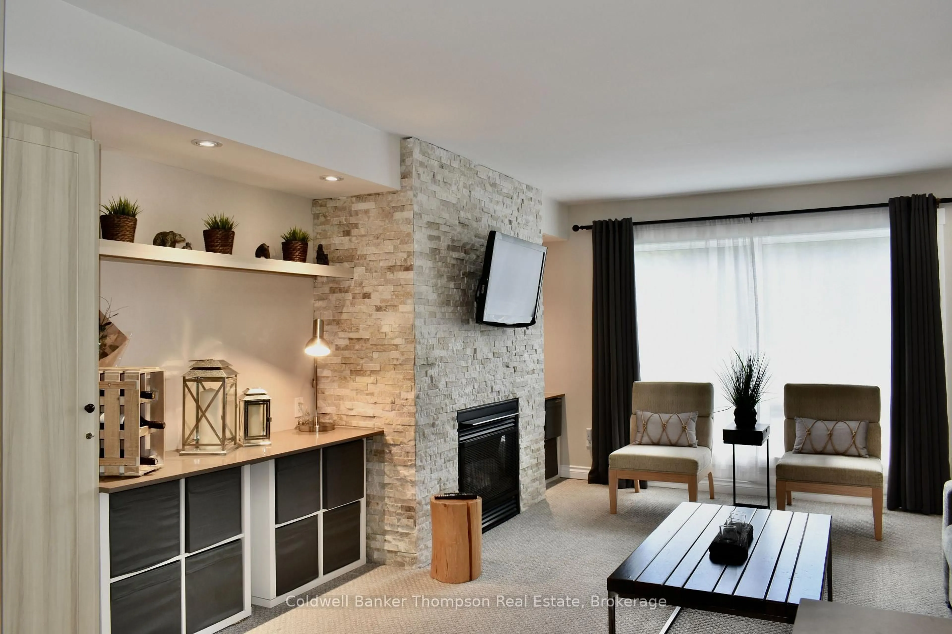 Living room with furniture, ceramic/tile floor for 1234 DEERHURST, SUMMIT LODGE Dr #54-208, Huntsville Ontario P1H 2E8