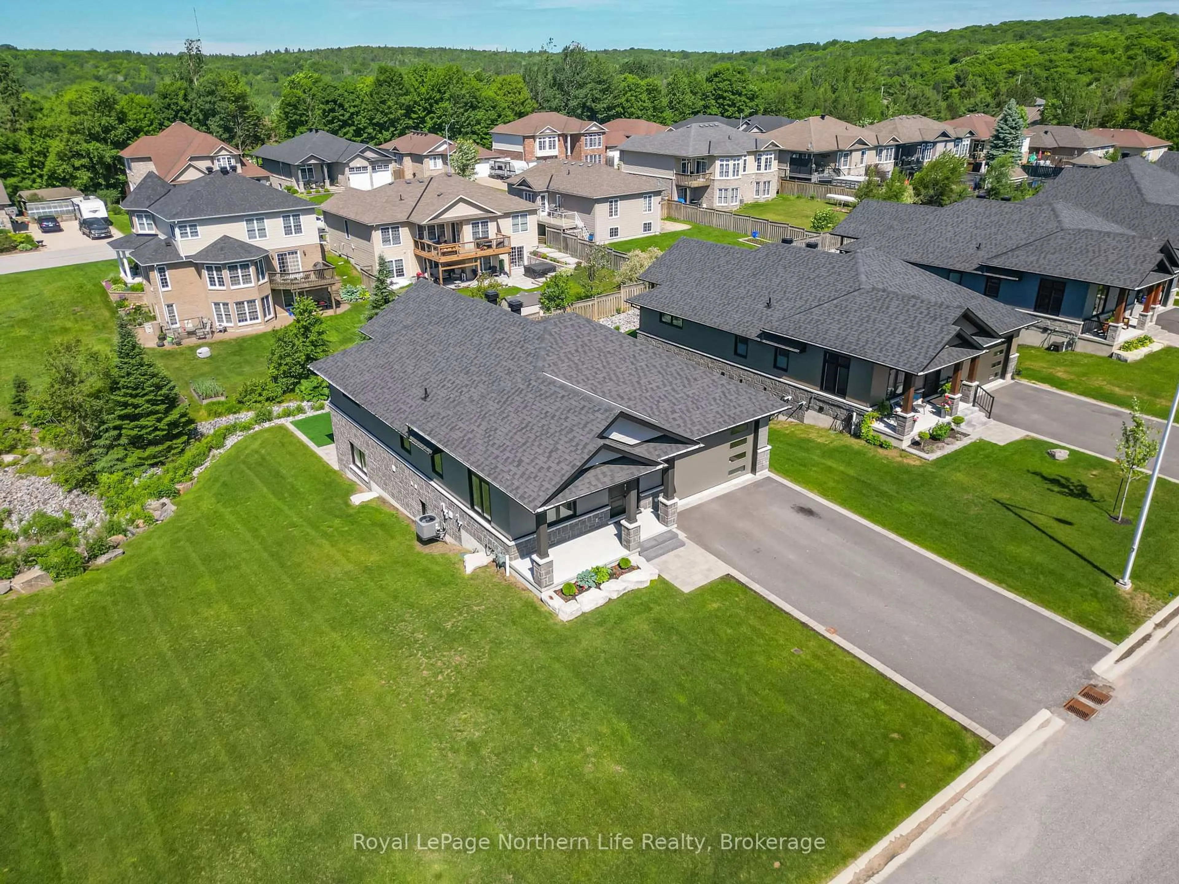 A pic from outside/outdoor area/front of a property/back of a property/a pic from drone, street for 9 Silver Maple Lane, North Bay Ontario P1C 0B5