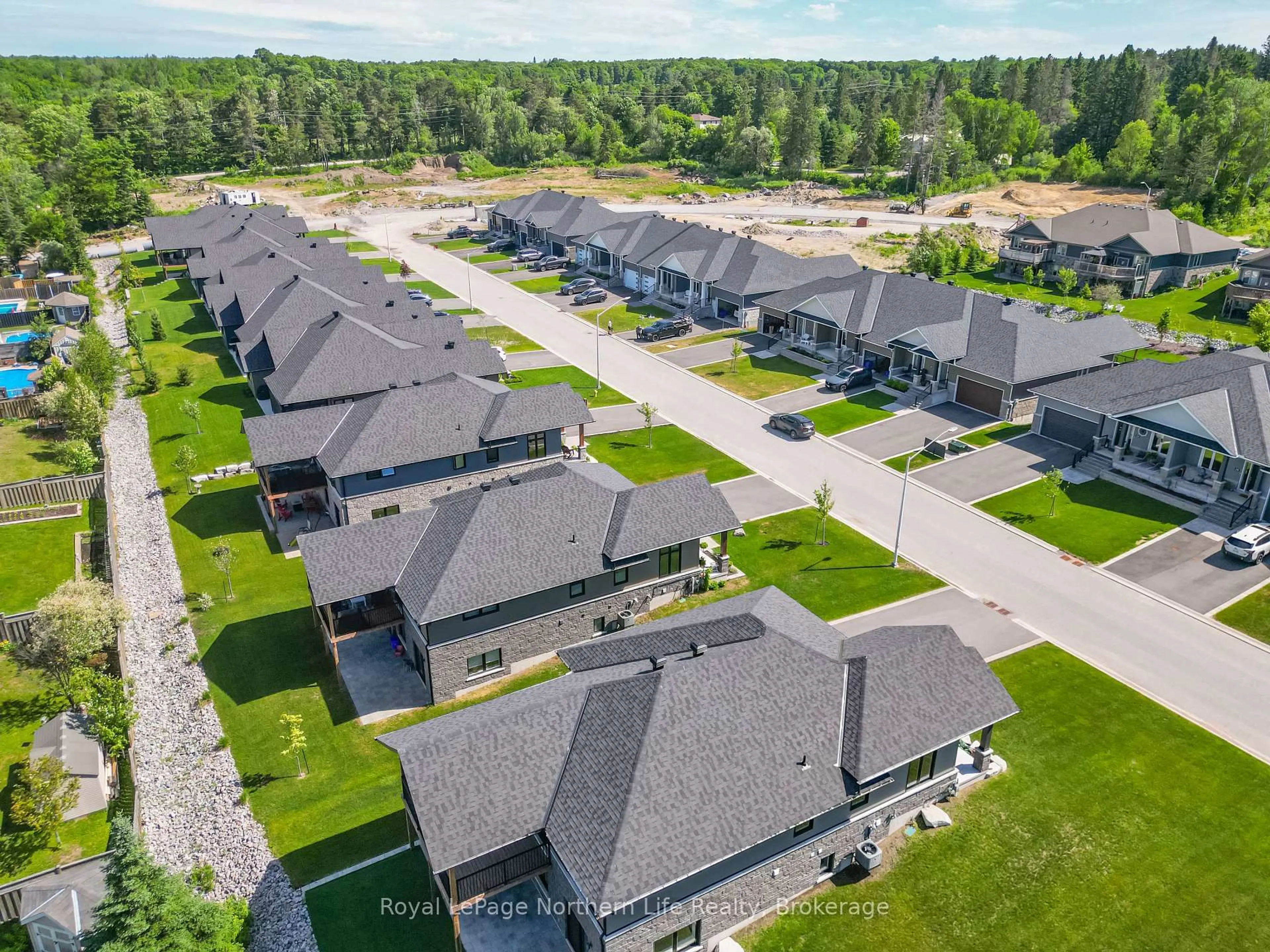 A pic from outside/outdoor area/front of a property/back of a property/a pic from drone, unknown for 9 Silver Maple Lane, North Bay Ontario P1C 0B5