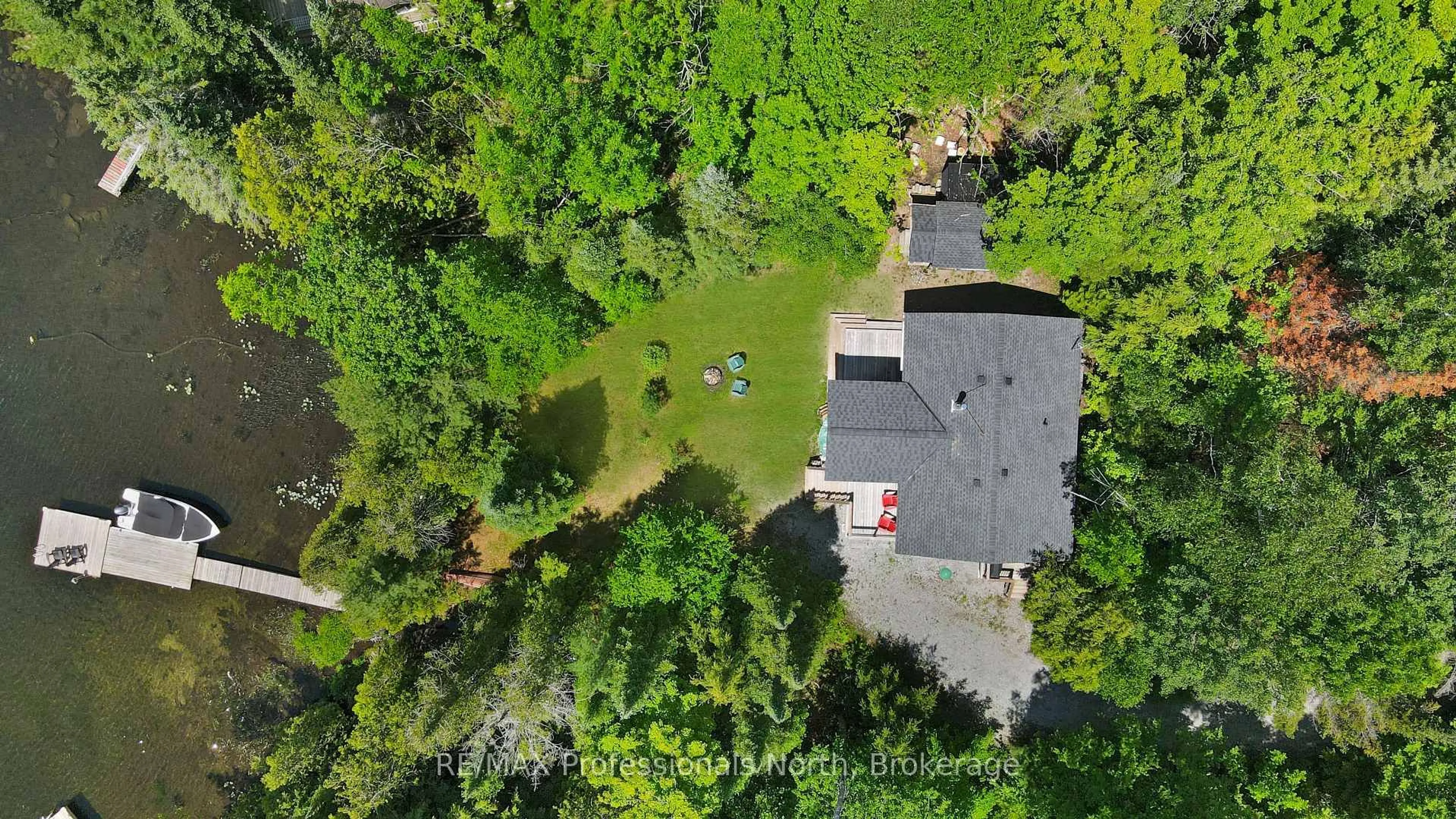 A pic from outside/outdoor area/front of a property/back of a property/a pic from drone, forest/trees view for 1368 Grosbeak Dr, Dysart et al Ontario K0L 1M1