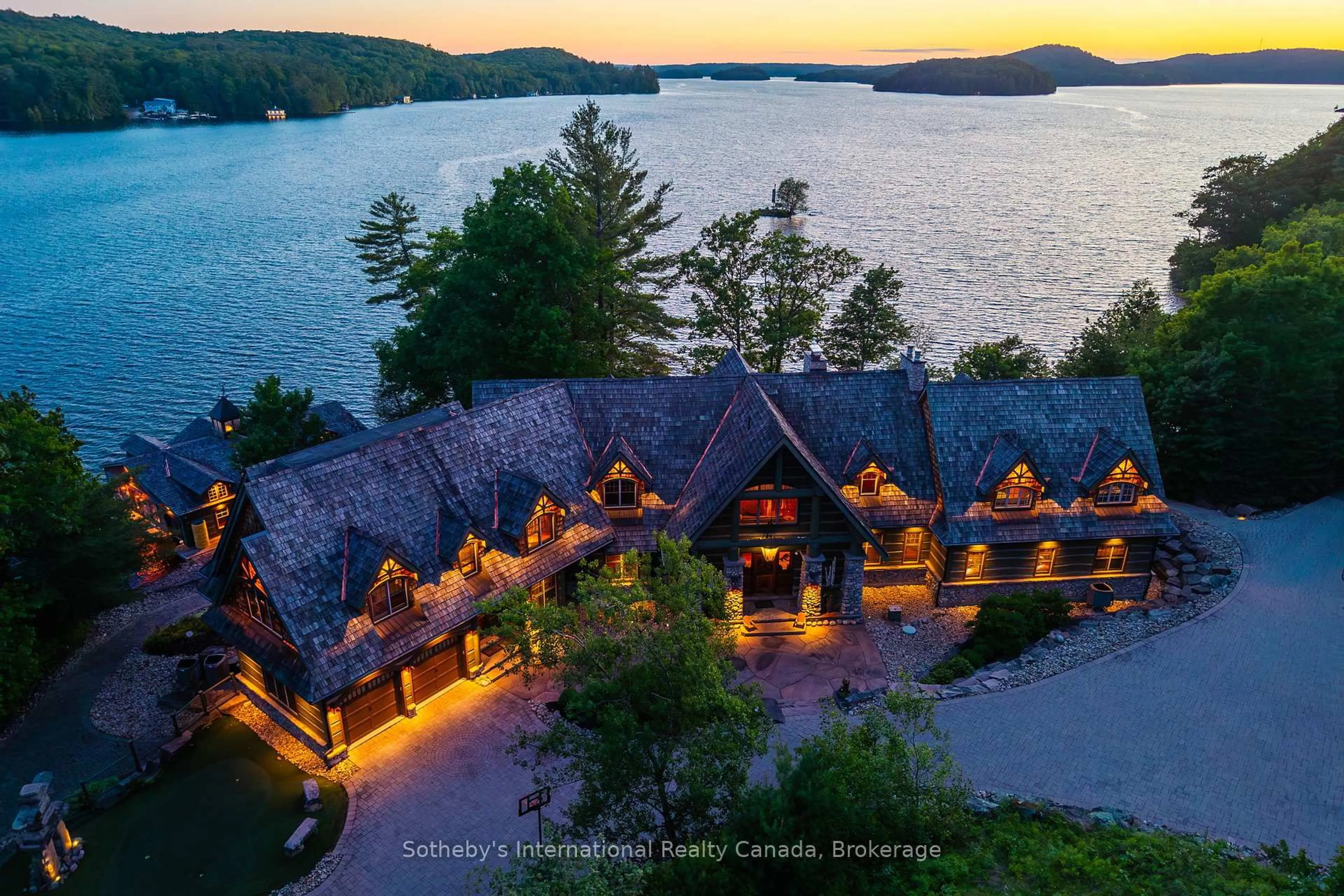 A pic from outside/outdoor area/front of a property/back of a property/a pic from drone, water/lake/river/ocean view for 1100 Delbrooke Rd #2, Lake of Bays Ontario P0A 1H0