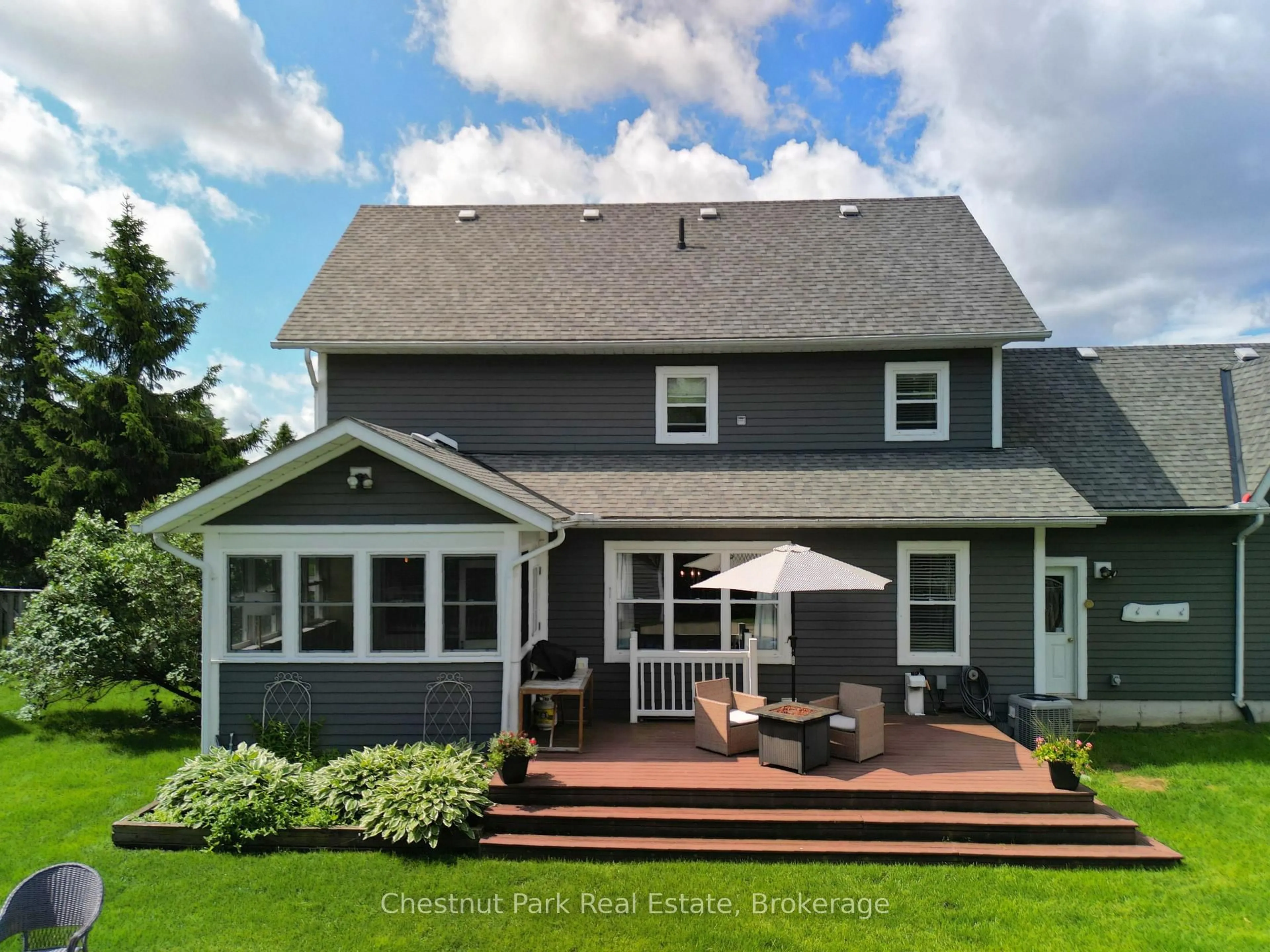 Home with vinyl exterior material, street for 208 Covered Bridge Tr, Bracebridge Ontario P1L 1Y3