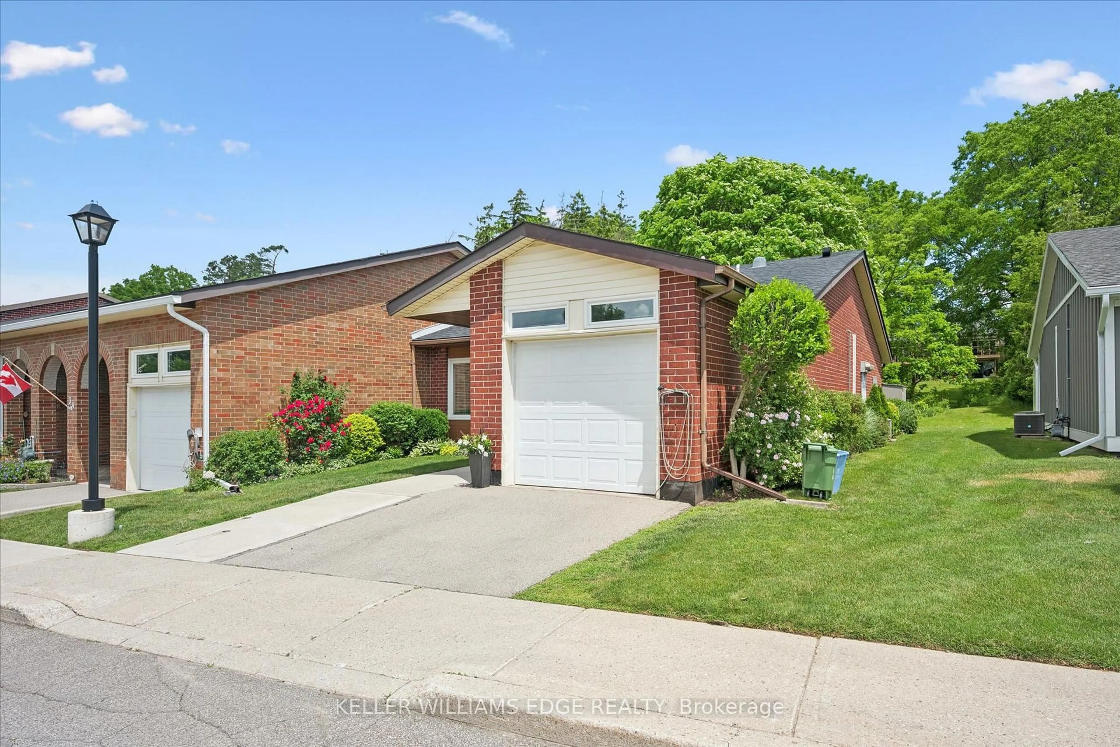 Home with brick exterior material, street for 32 Cardinal Mindszenty Blvd, Hamilton Ontario L9B 2M3