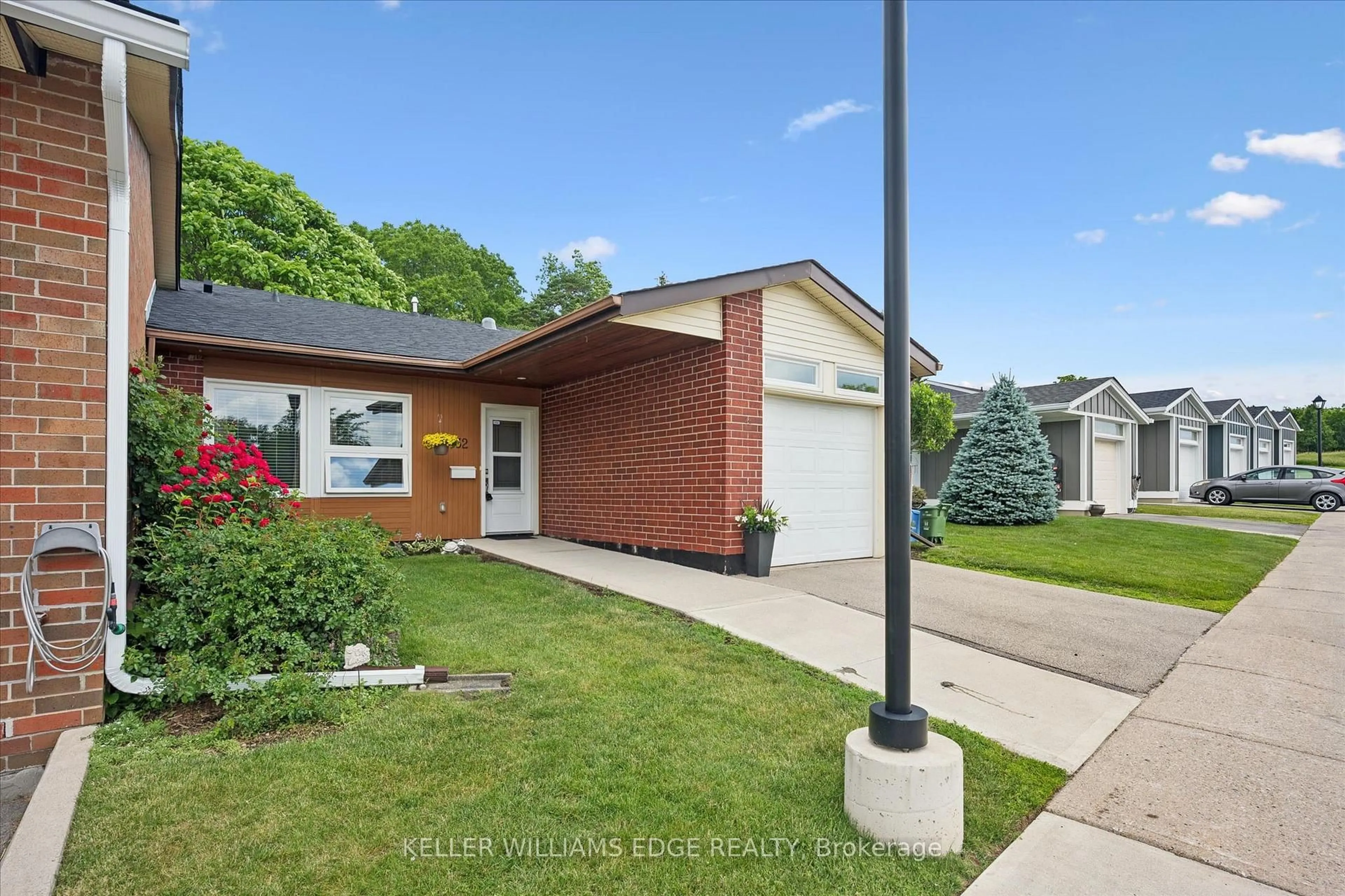 Home with brick exterior material, street for 32 Cardinal Mindszenty Blvd, Hamilton Ontario L9B 2M3