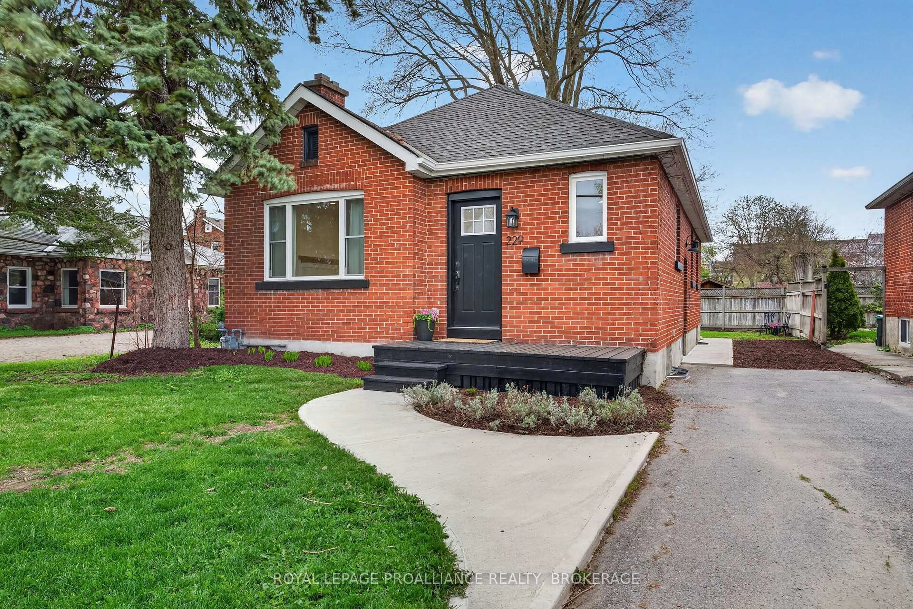 Home with brick exterior material, street for 229 Park St, Kingston Ontario K7L 1K4
