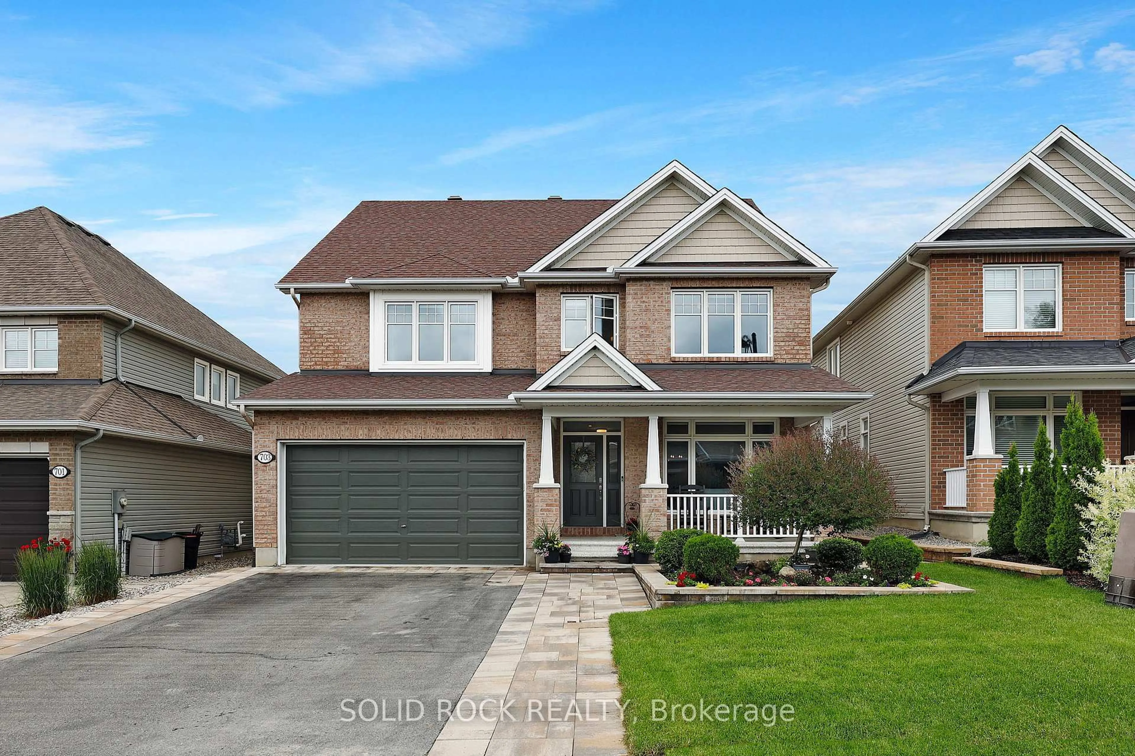 Home with brick exterior material, street for 703 Mashkig Ave, Ottawa Ontario K4A 0Y7