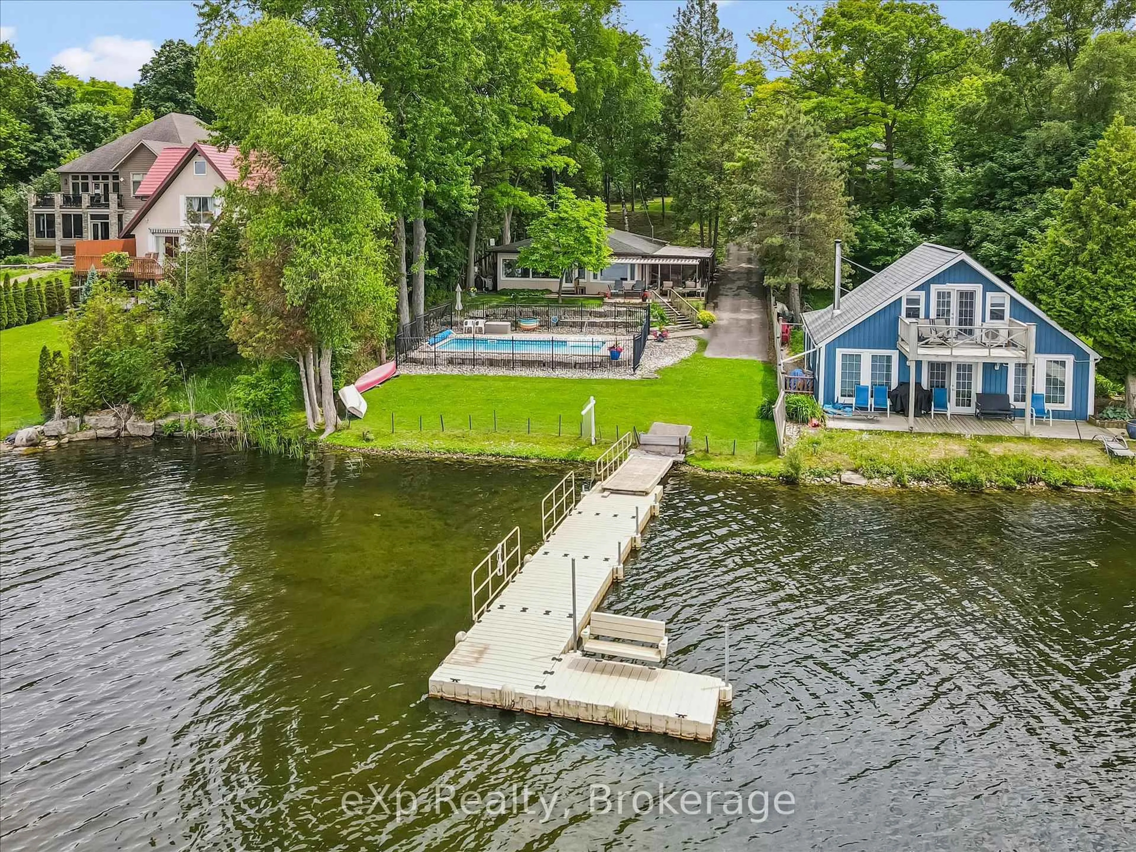 A pic from outside/outdoor area/front of a property/back of a property/a pic from drone, water/lake/river/ocean view for 20 Clergy Lane, Puslinch Ontario N0B 2J0