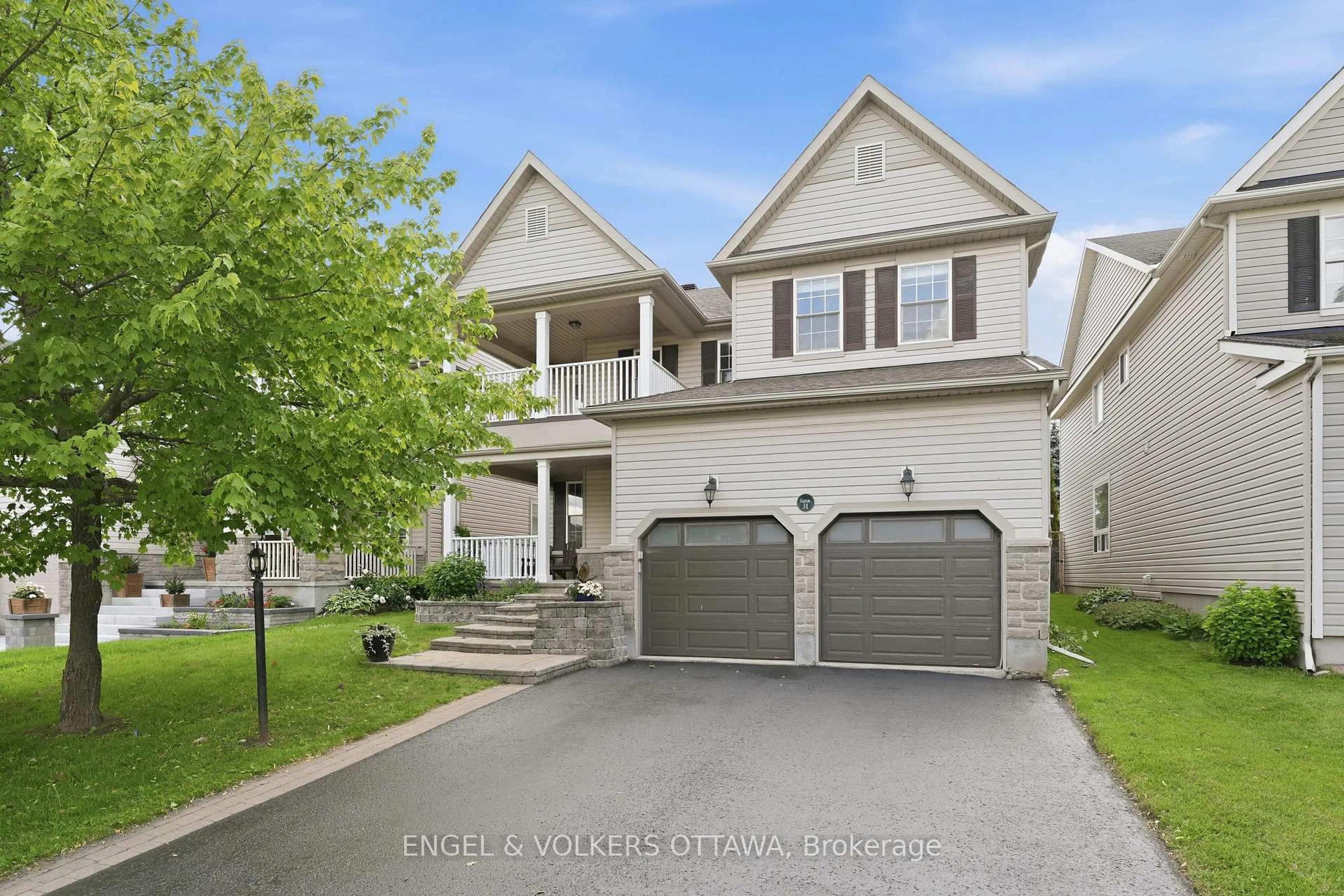 Home with vinyl exterior material, street for 31 Leatherwood Cres, Ottawa Ontario K2J 4X9